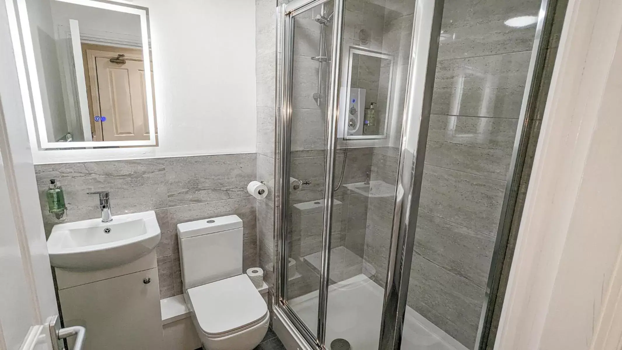 Shower, Bathroom in Cocoon @ International Inn + Apartments