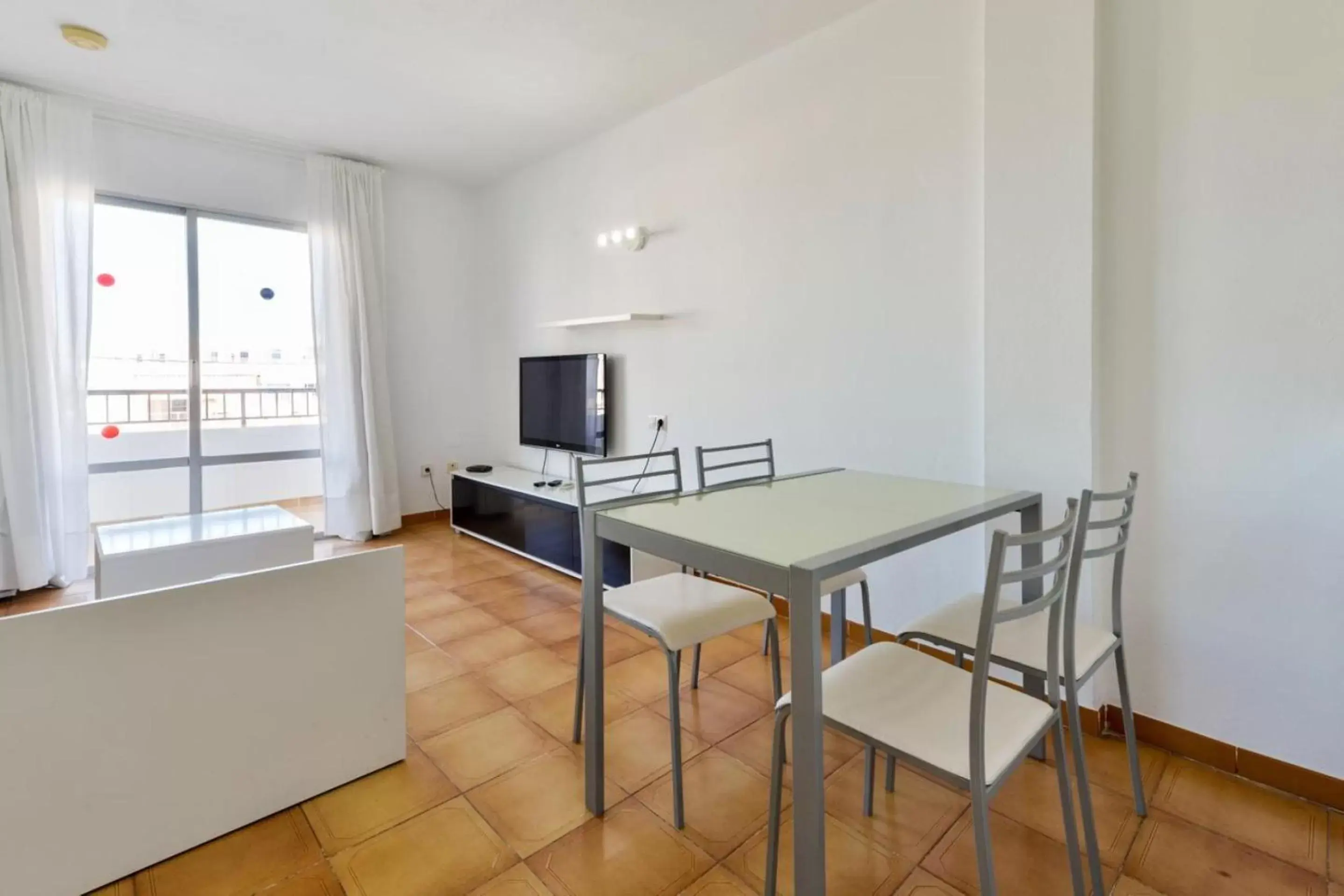 TV and multimedia, Dining Area in Apartamentos San Antonio Beach