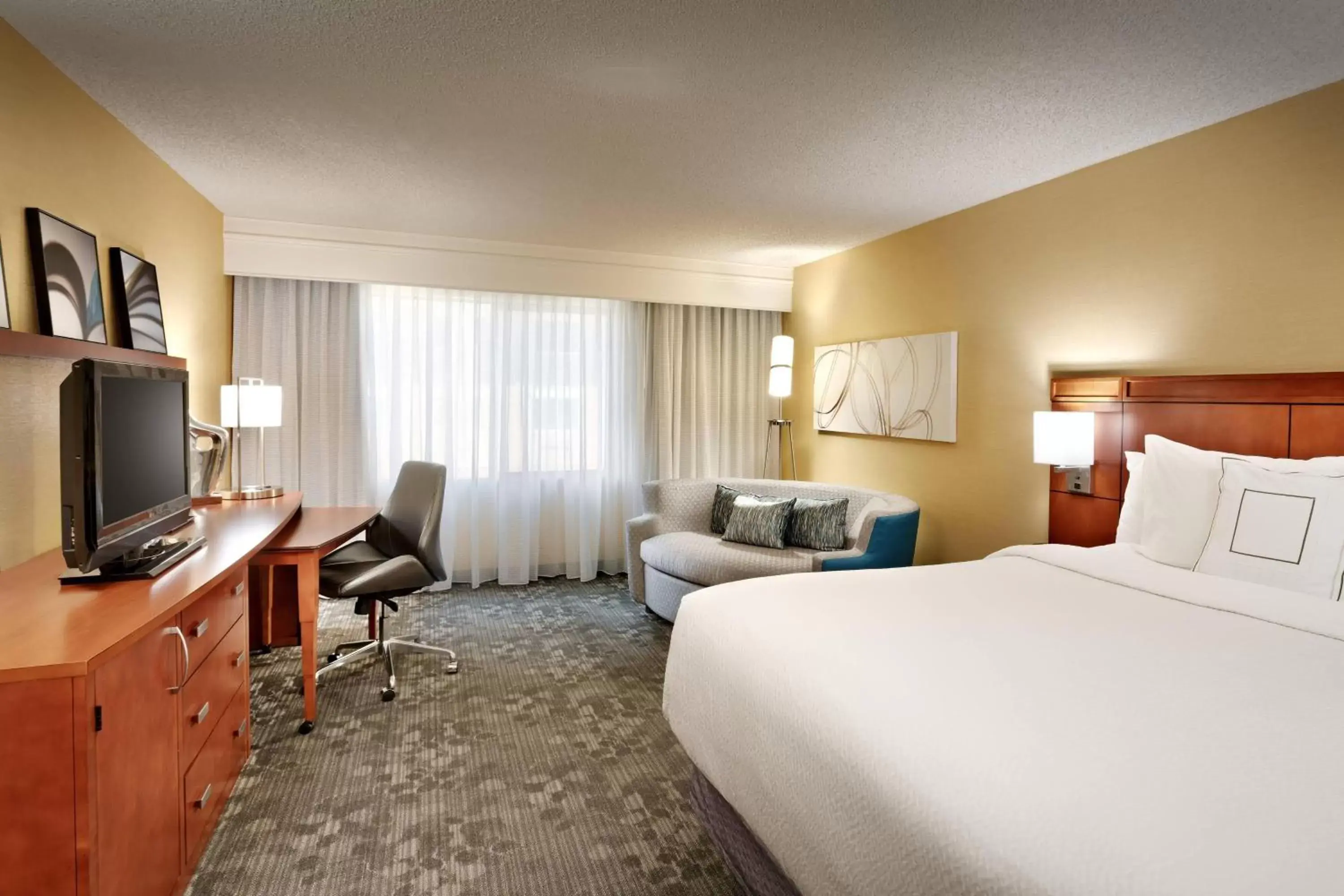 Photo of the whole room, TV/Entertainment Center in Courtyard by Marriott Salt Lake City Sandy