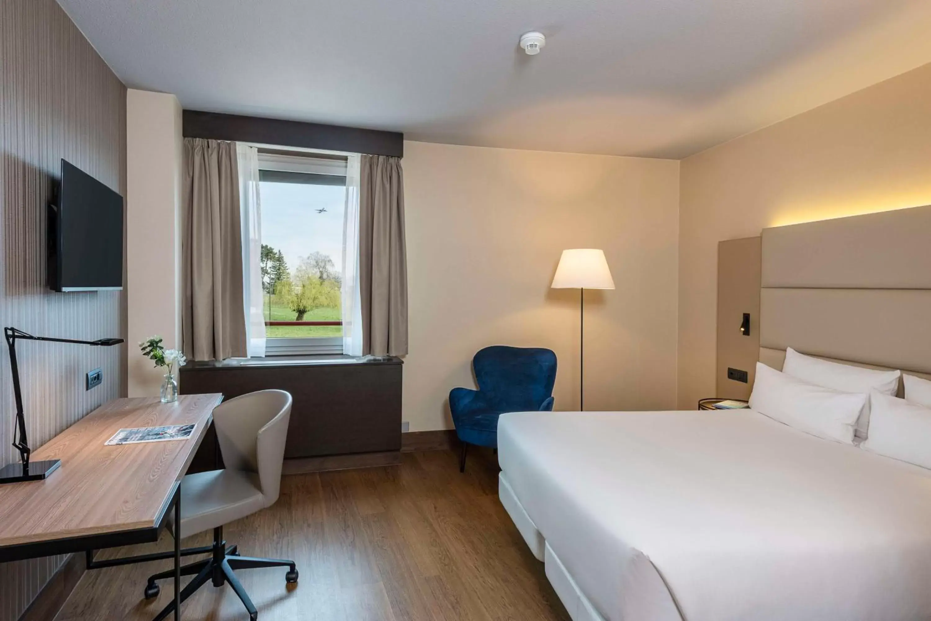 Bedroom in NH Geneva Airport Hotel