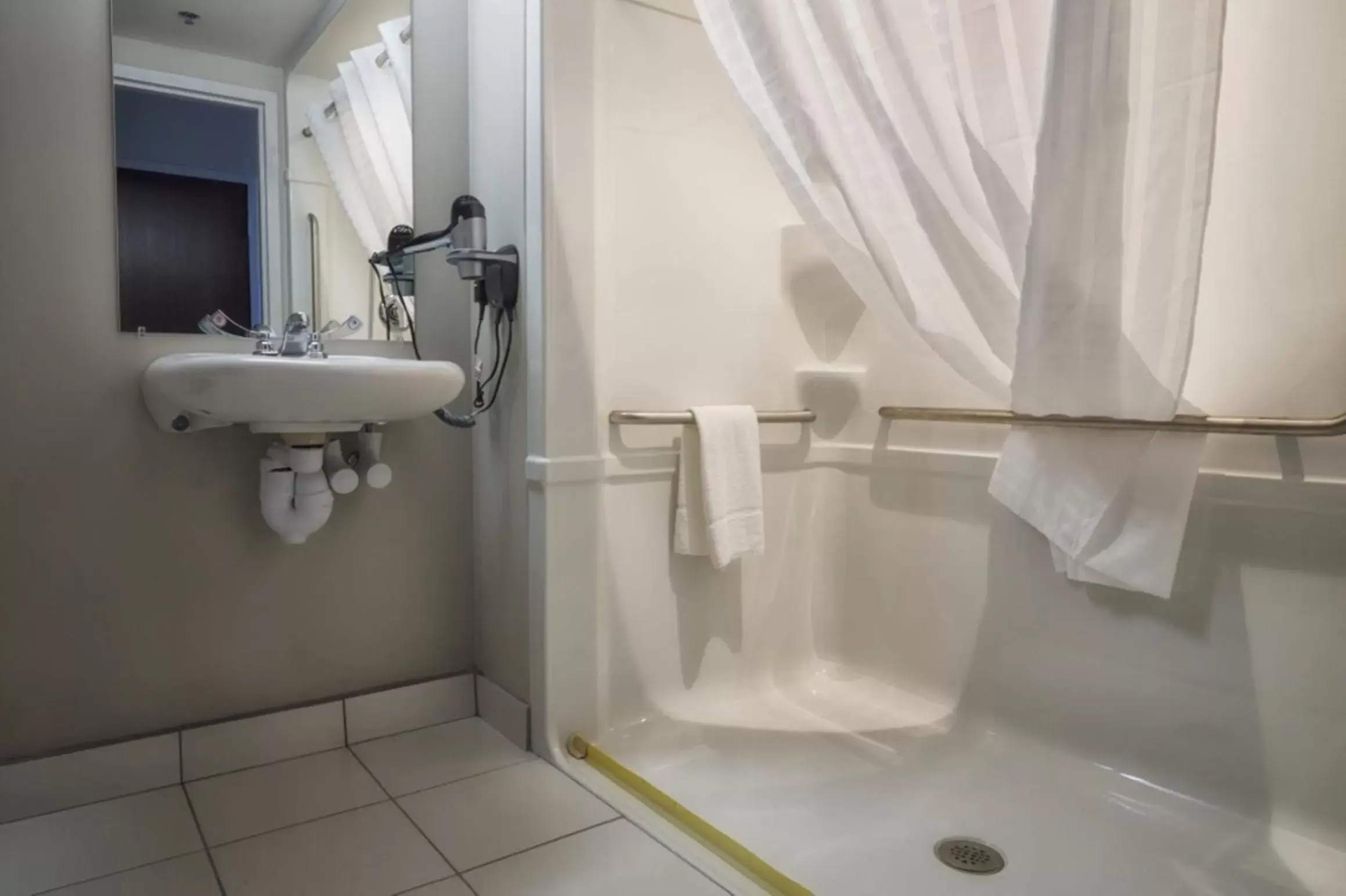 Bathroom in Microtel Inn & Suites Sault Ste. Marie