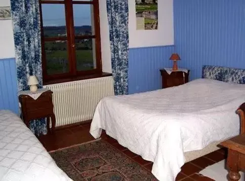 Photo of the whole room, Bed in Ferme du Montheu