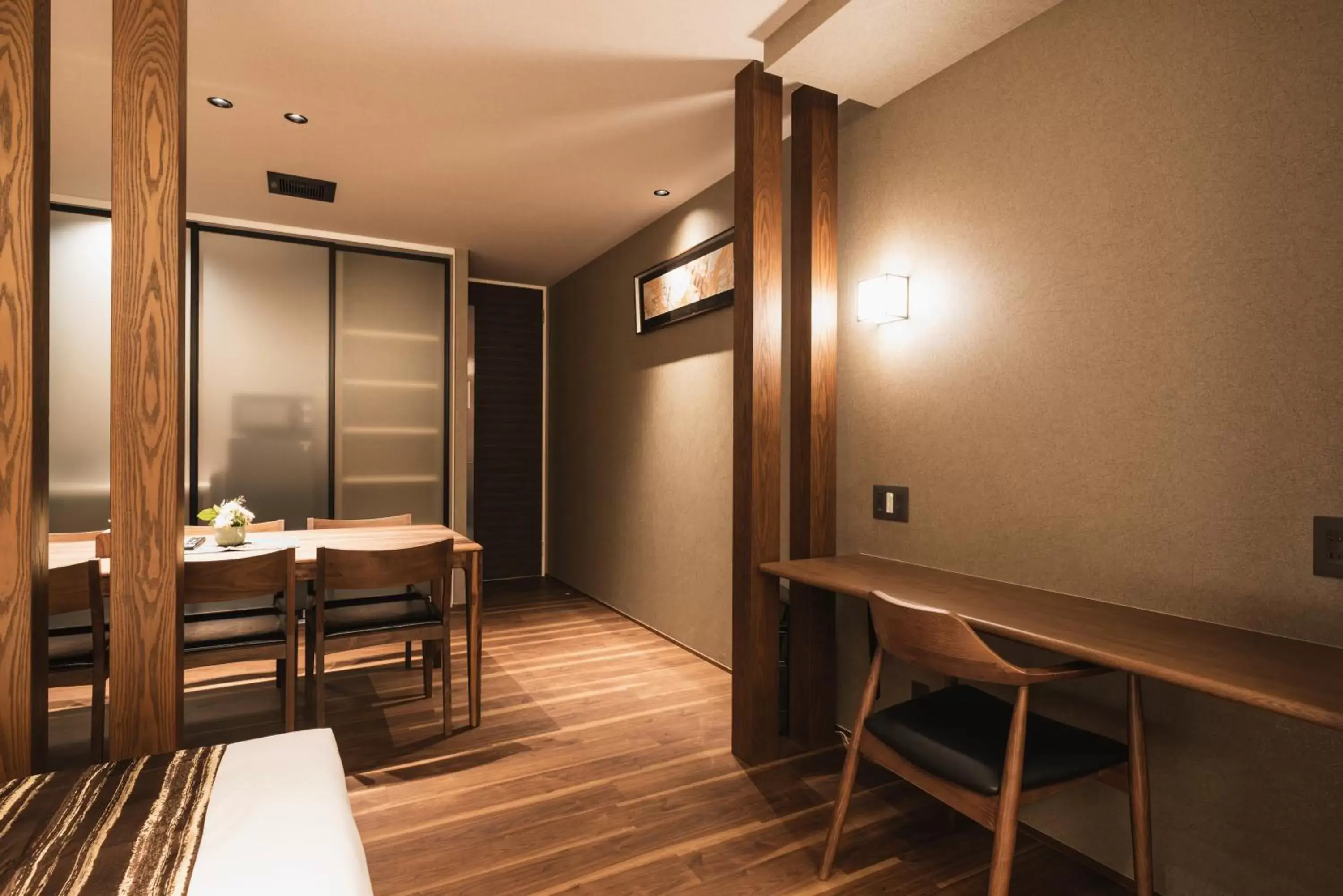 Photo of the whole room, Dining Area in GRAND BASE Beppu Ekihigashi