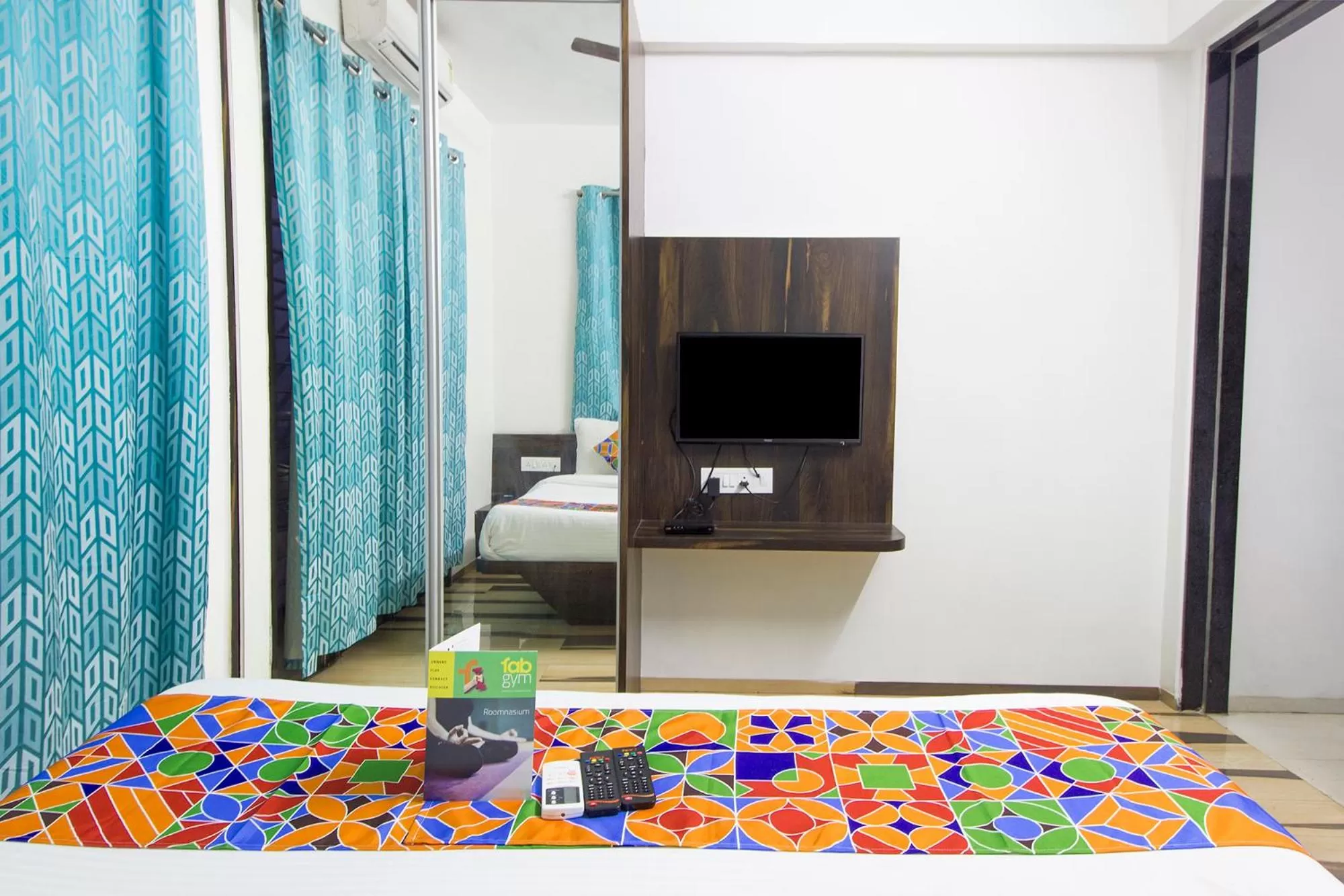 Bedroom, TV/Entertainment Center in FabHotel Pruthamesh Pride