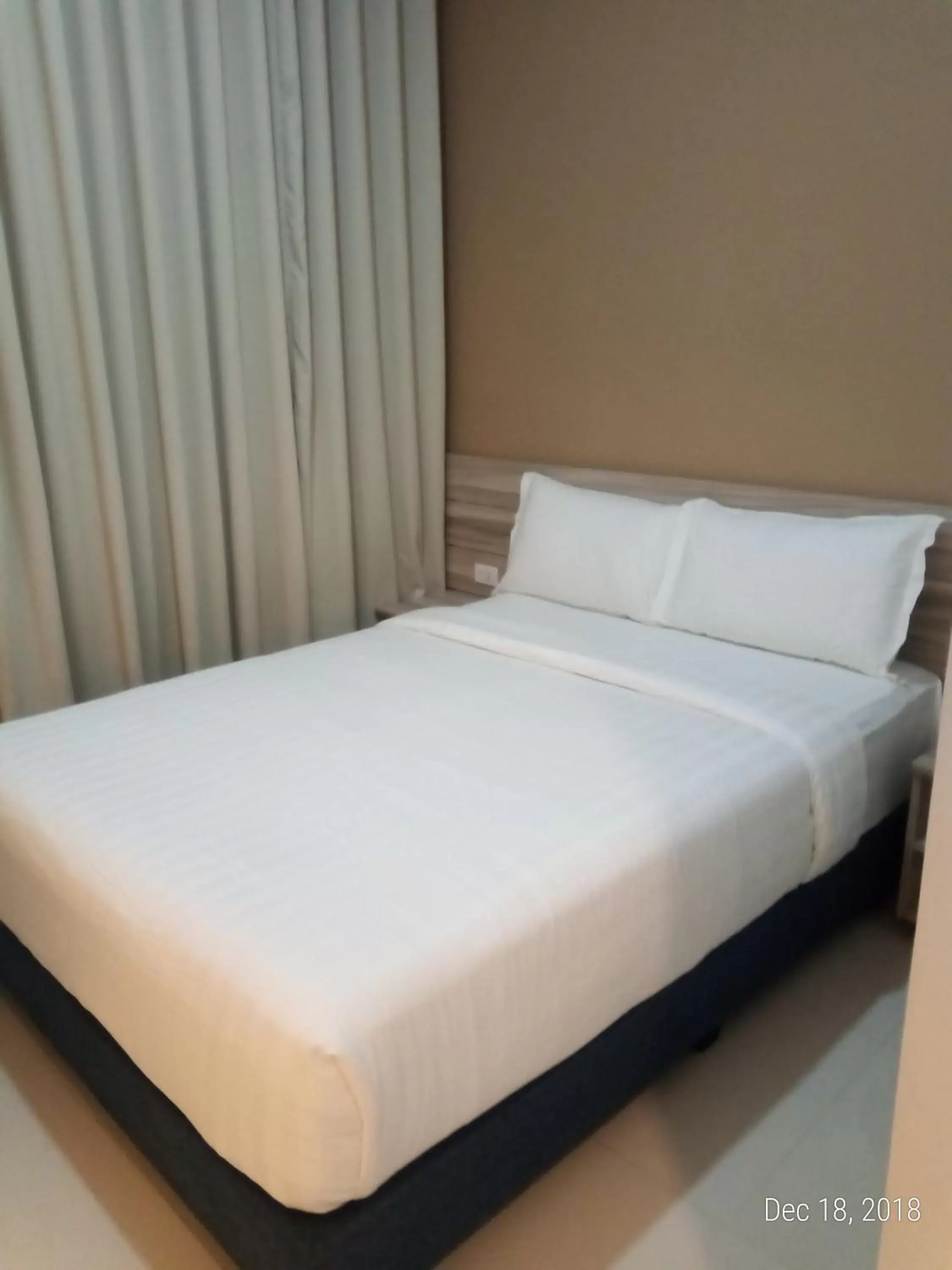 Bed in Figtree Hotel