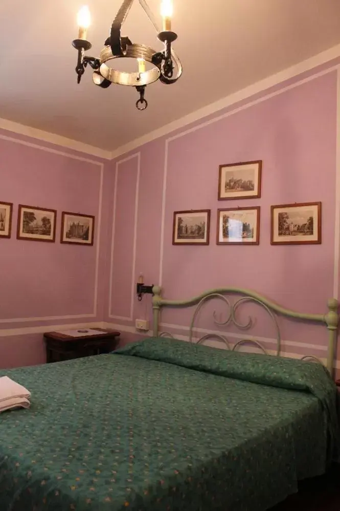 Photo of the whole room, Bed in Locanda Laudomia