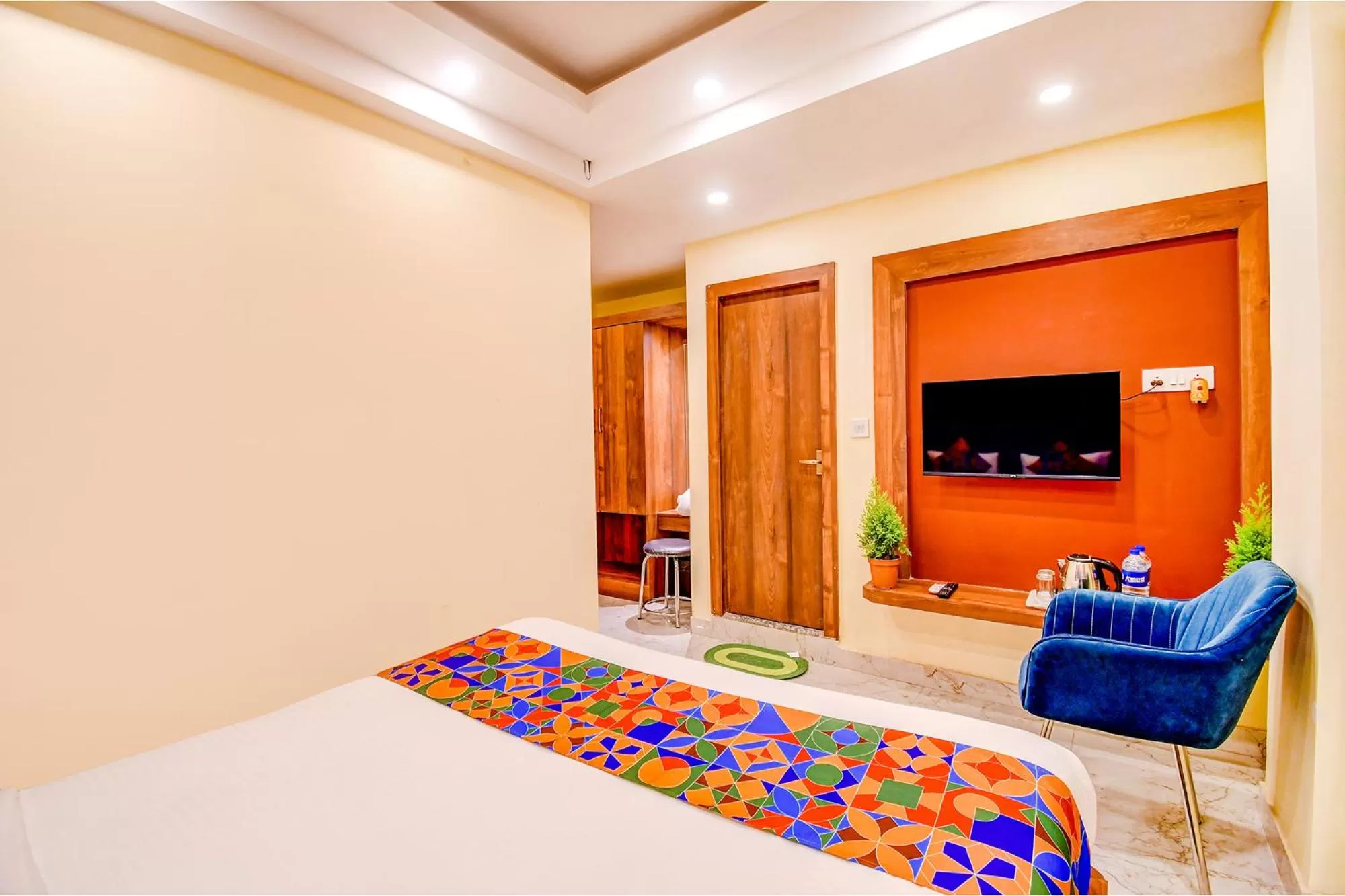 Communal lounge/ TV room, Bed in FabHotel Aqua Tulip - Nr Milan Mela