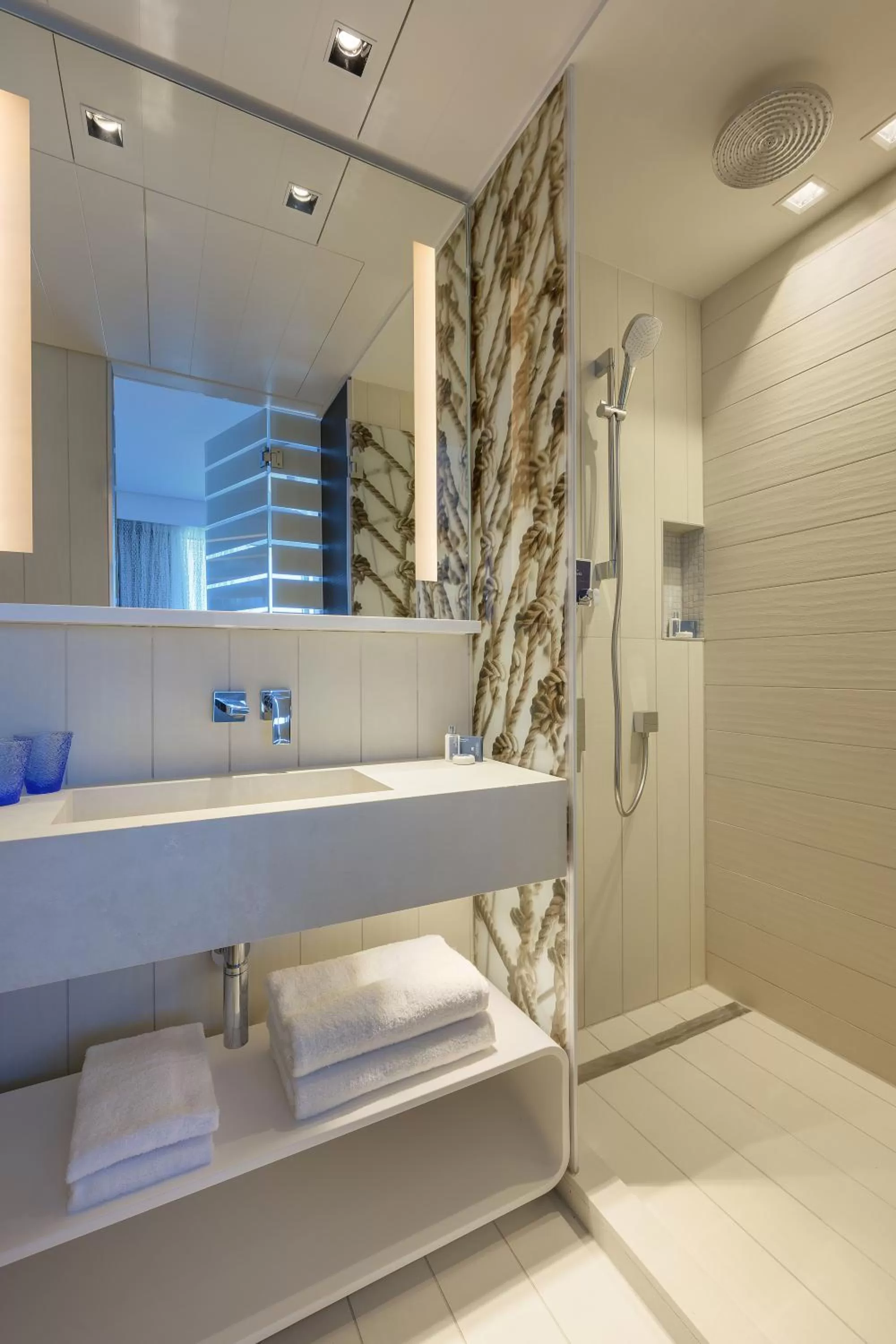 Bathroom in Port Tower by Isrotel Design