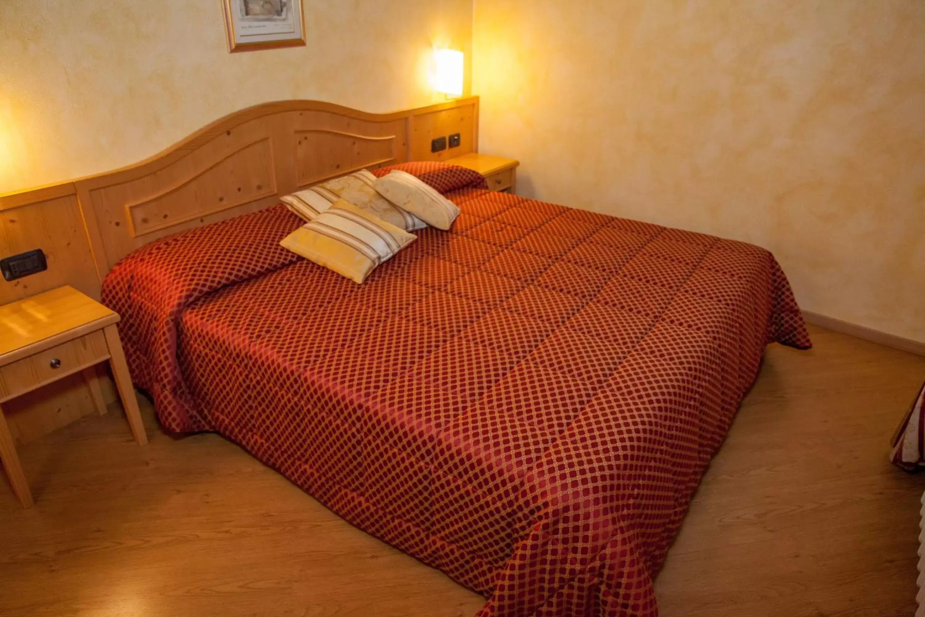 Bed in Hotel Garni Le Corti