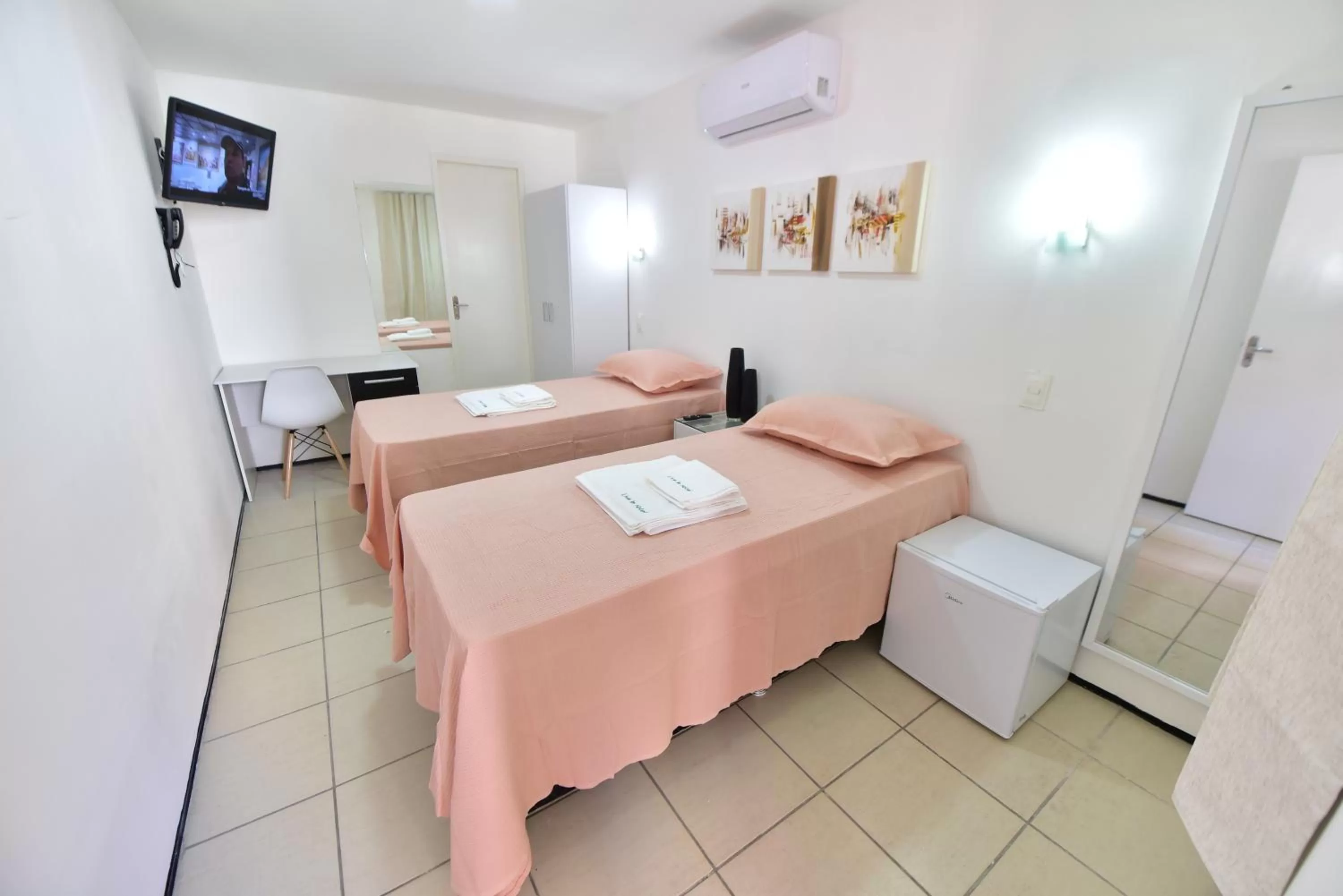 Bed in LIVE IN FORTALEZA HOTEL