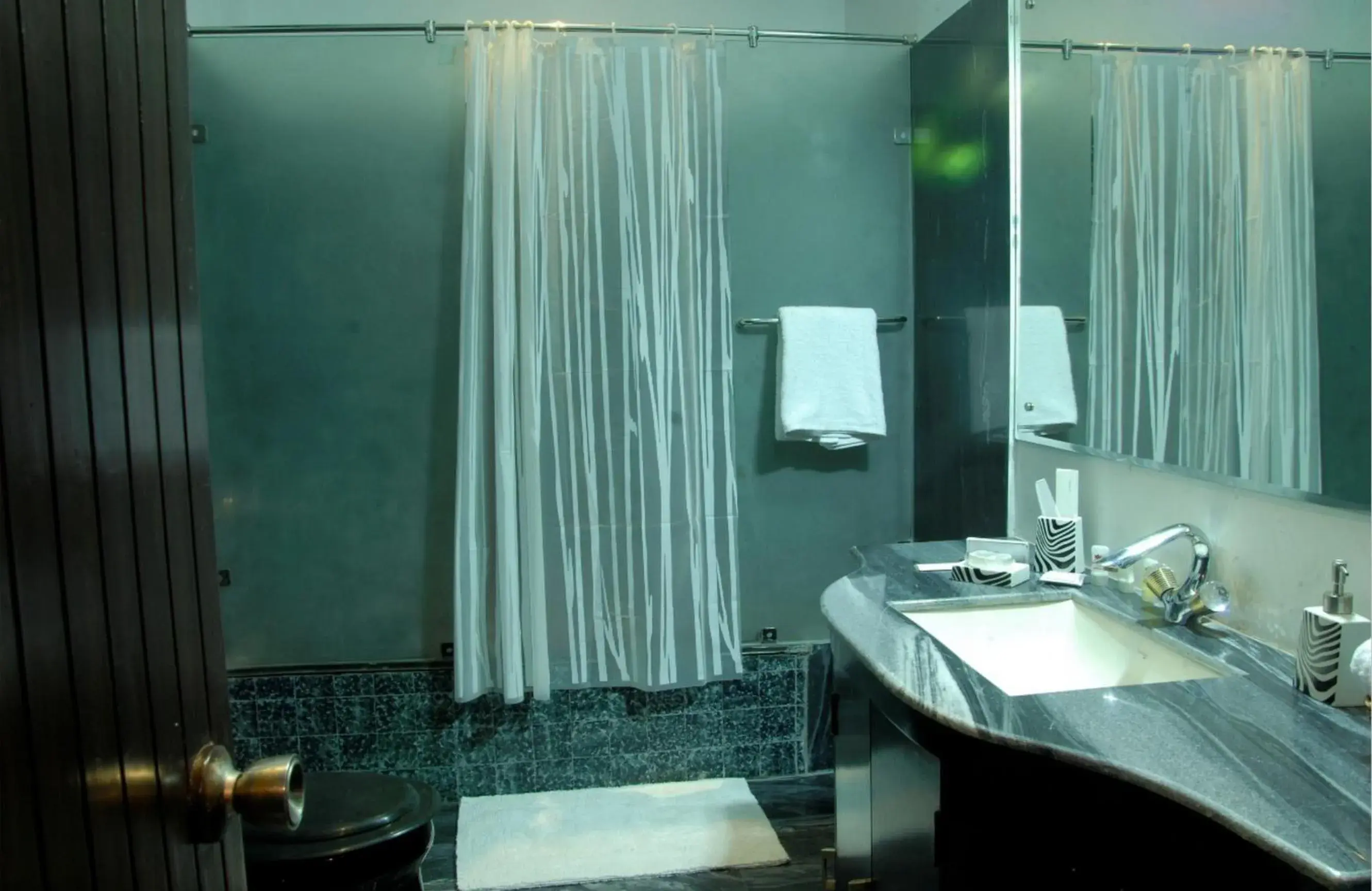 Bathroom in 66 Residency - A Boutique Hotel