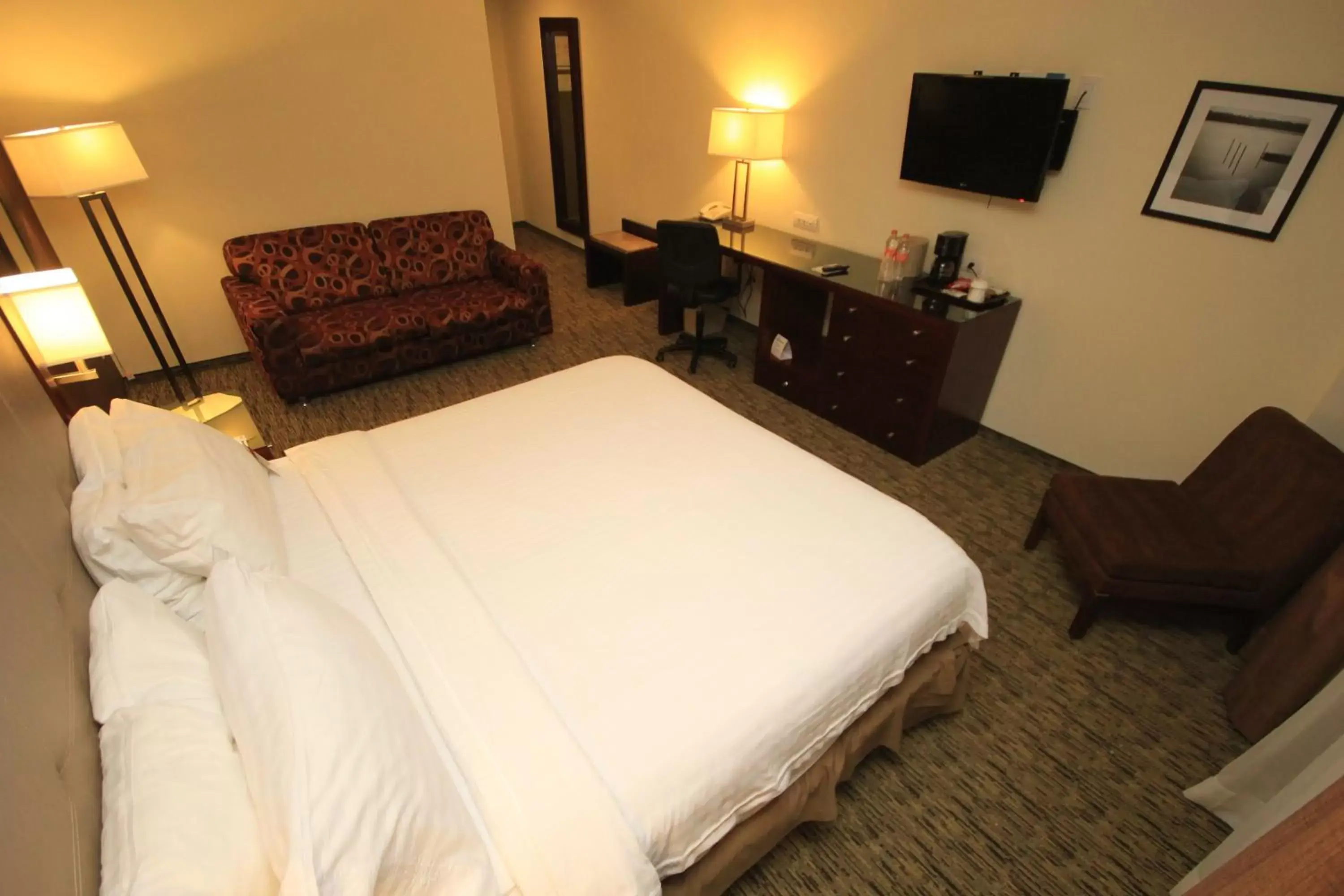 Bed in Holiday Inn Leon, an IHG Hotel