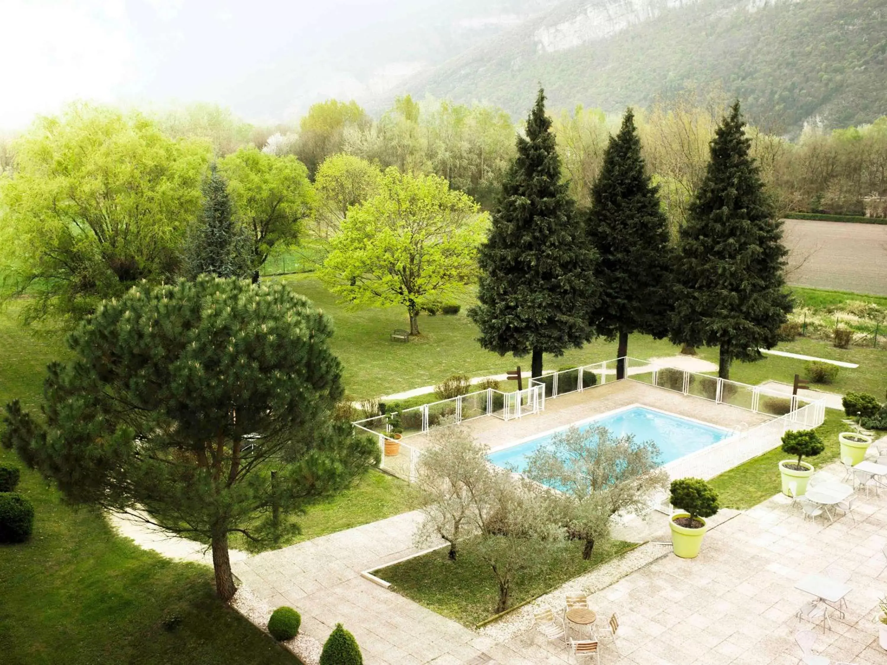 Property building, Pool View in Novotel Grenoble Nord Voreppe