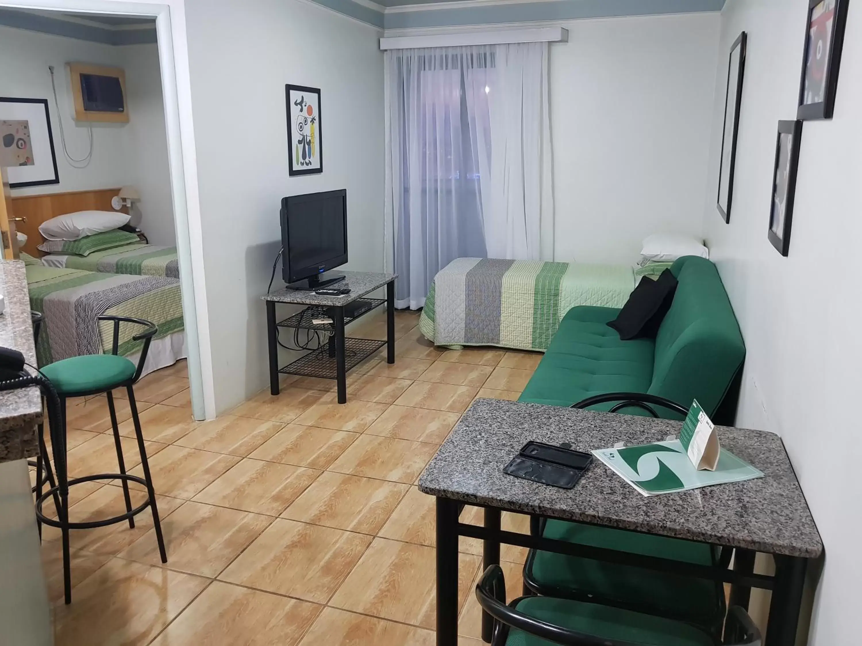 Bed, Seating Area in Flat Saint Paul Residence