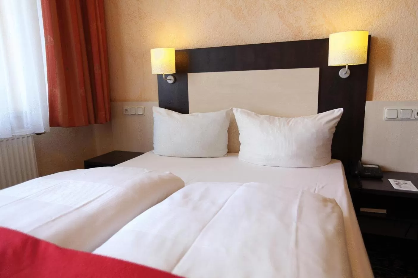 Bed in Adesso Hotel Kassel