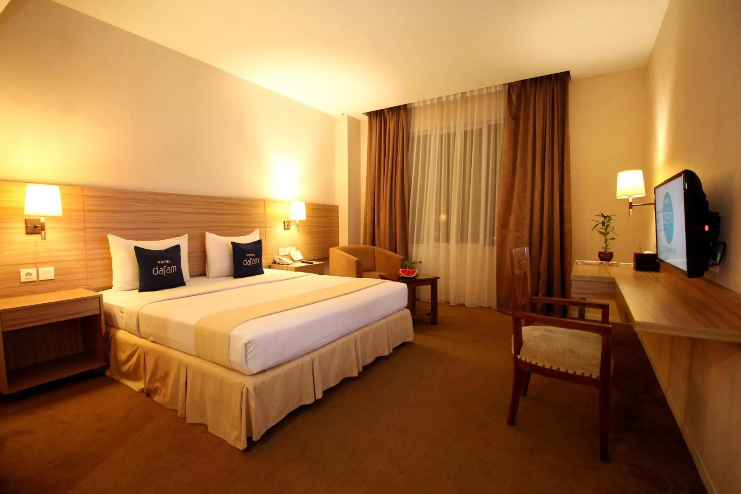 Bed in Hotel Dafam Pekanbaru