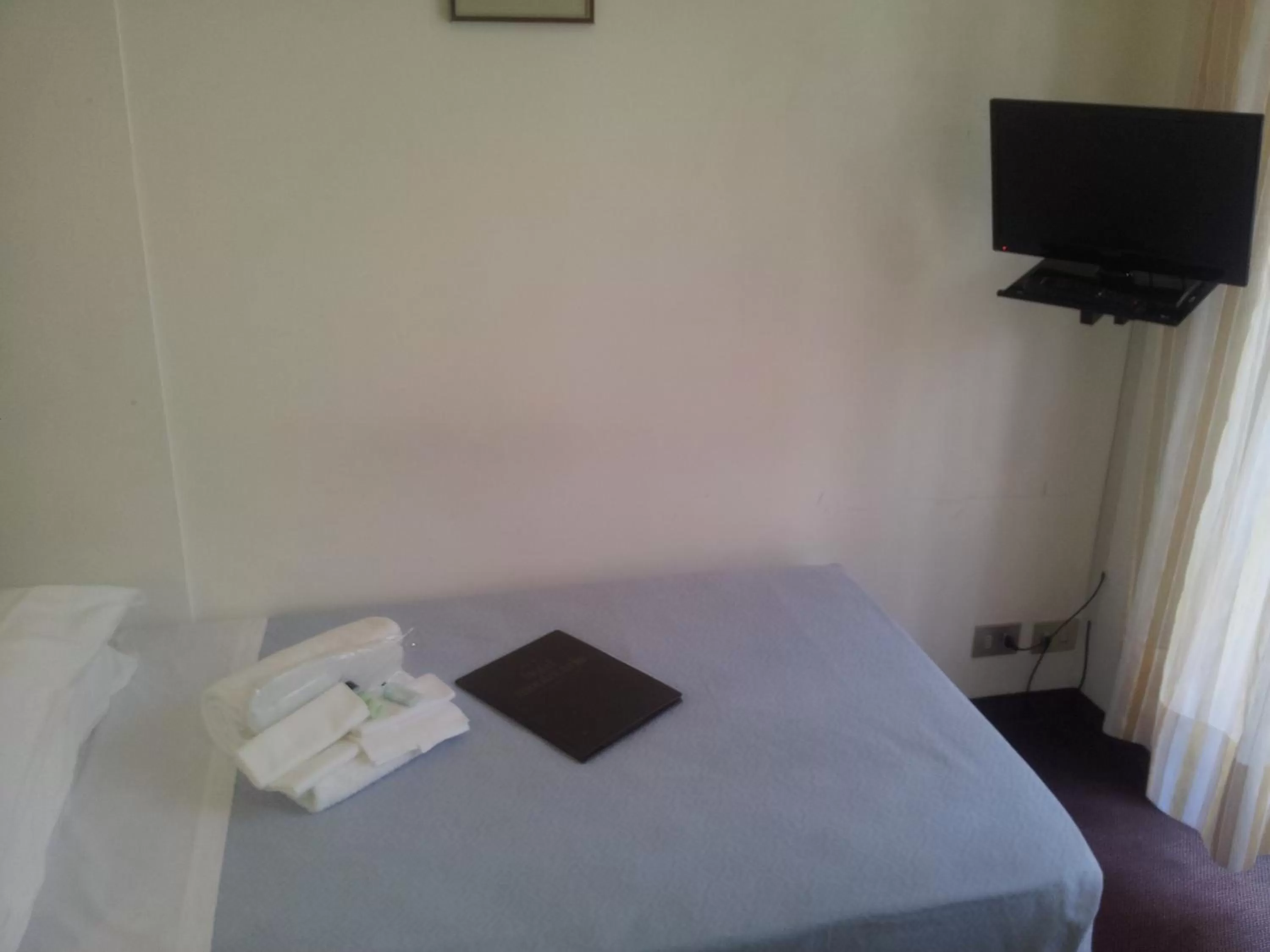 Bed in Hotel Montecarlo