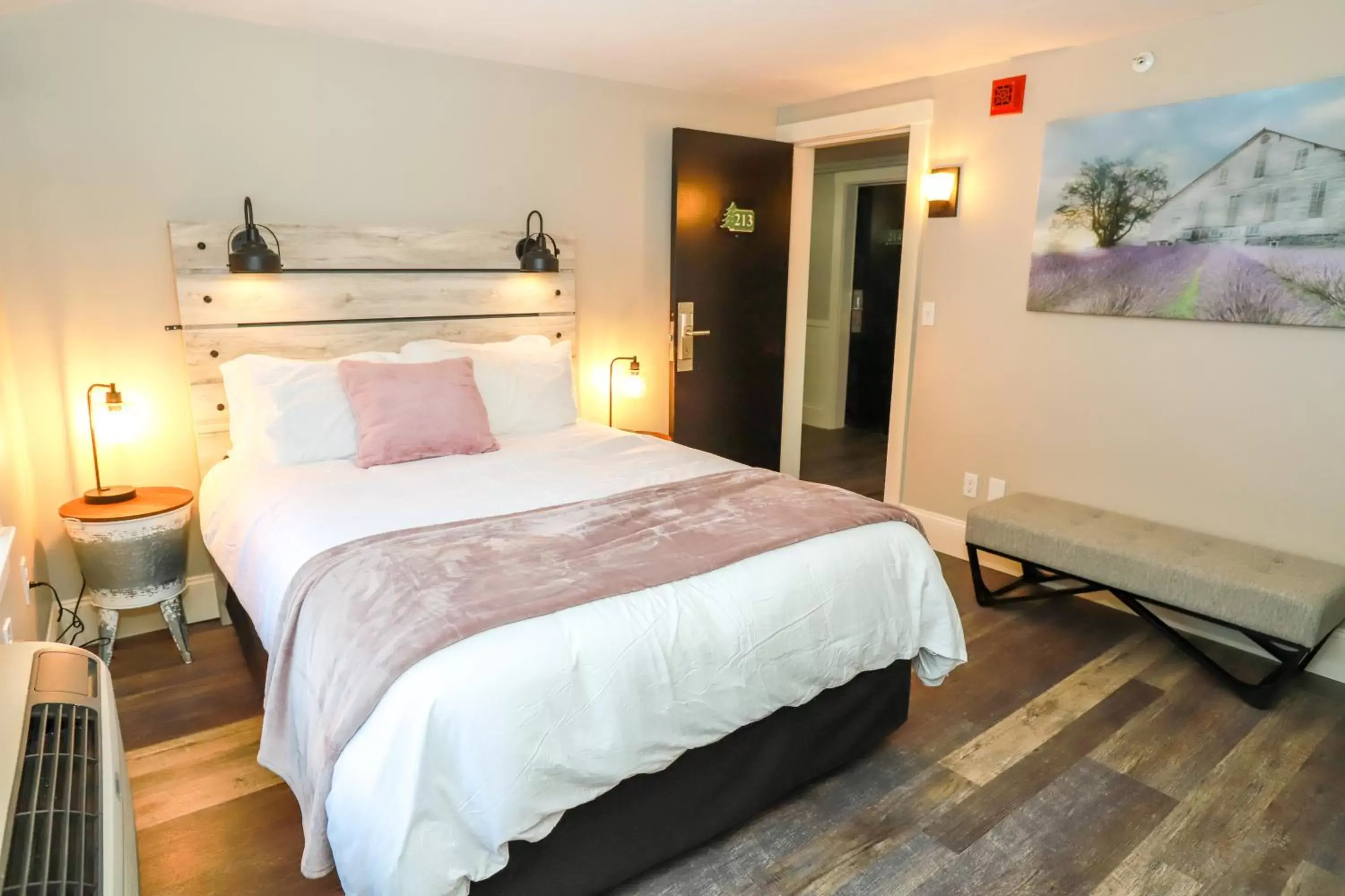 Bed in Gunstock Inn & Suites