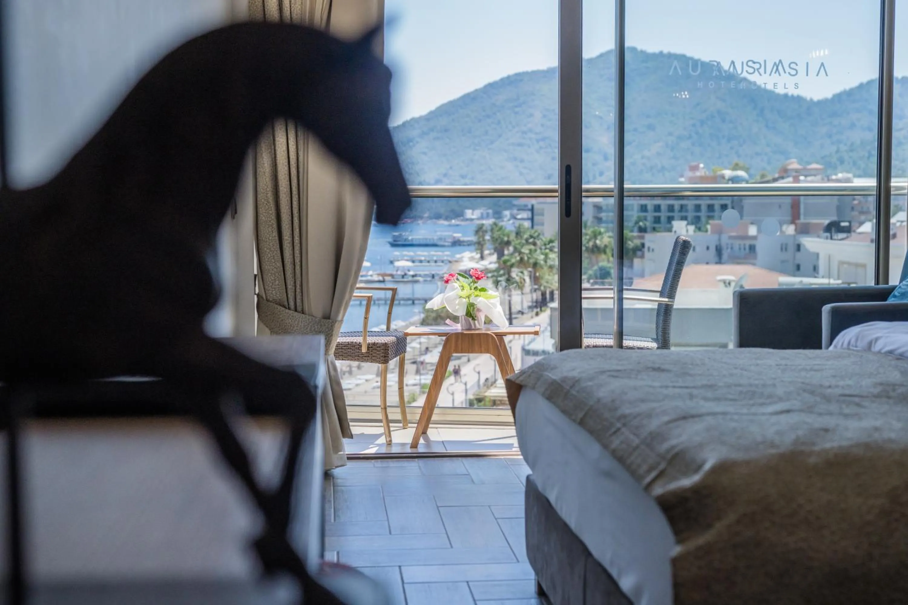 Bed in Aurasia Beach Hotel