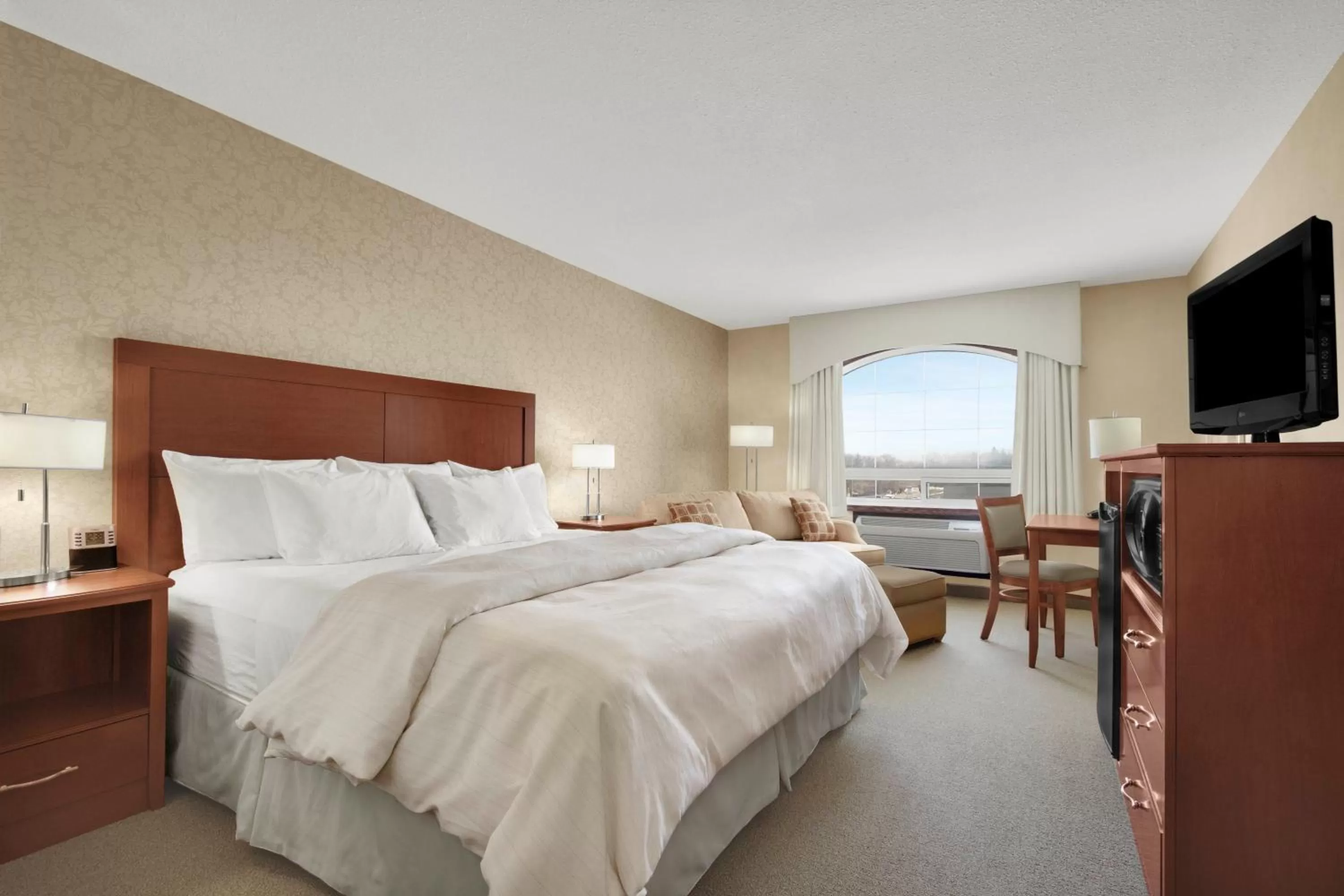 Bed in Days Inn & Suites by Wyndham Brandon