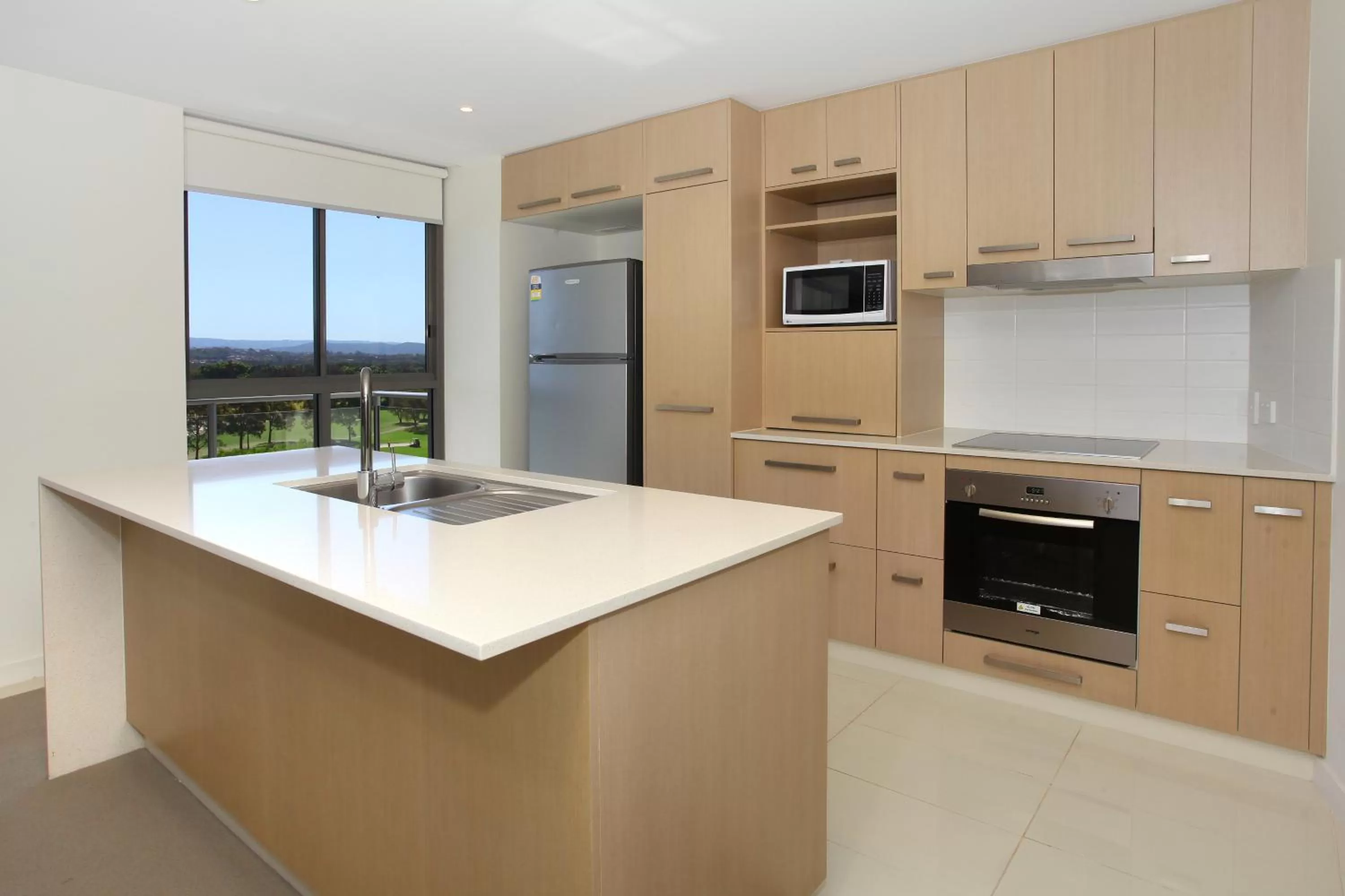 Kitchen or kitchenette in Signature Waterfront Apartments