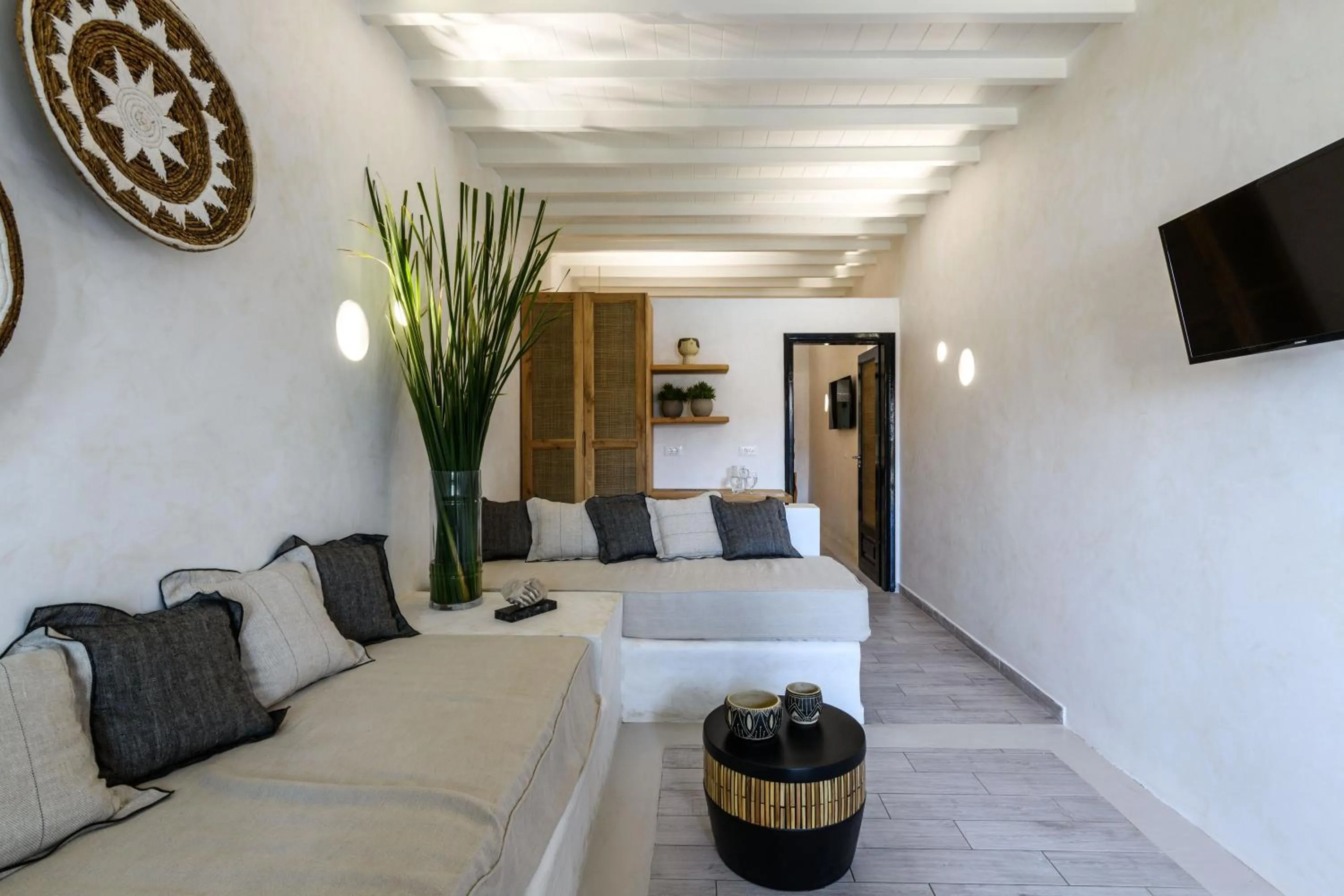 Living room, Bed in Panormos Village Hotel