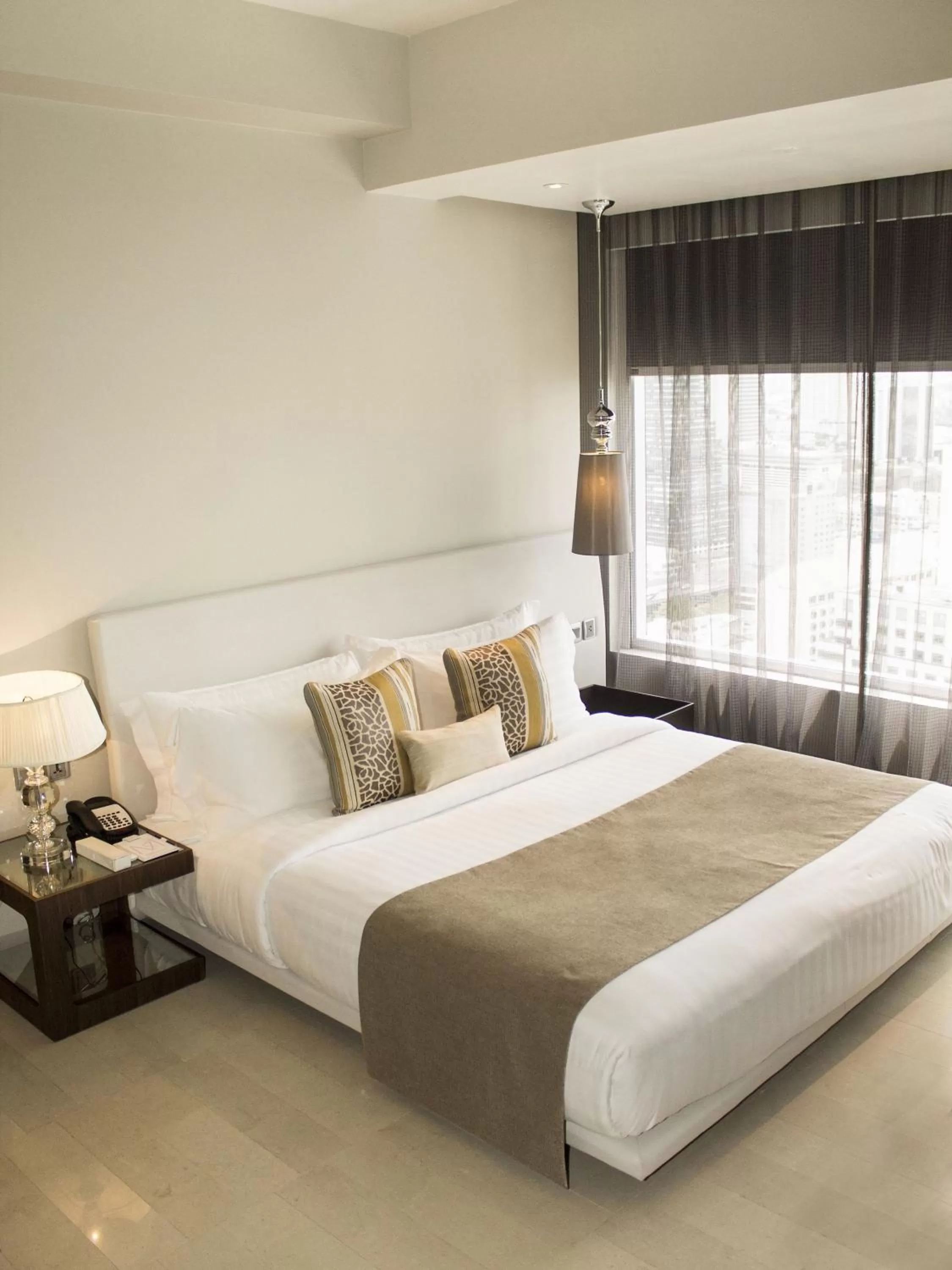 Bed in Mode Sathorn Hotel - SHA Extra Plus