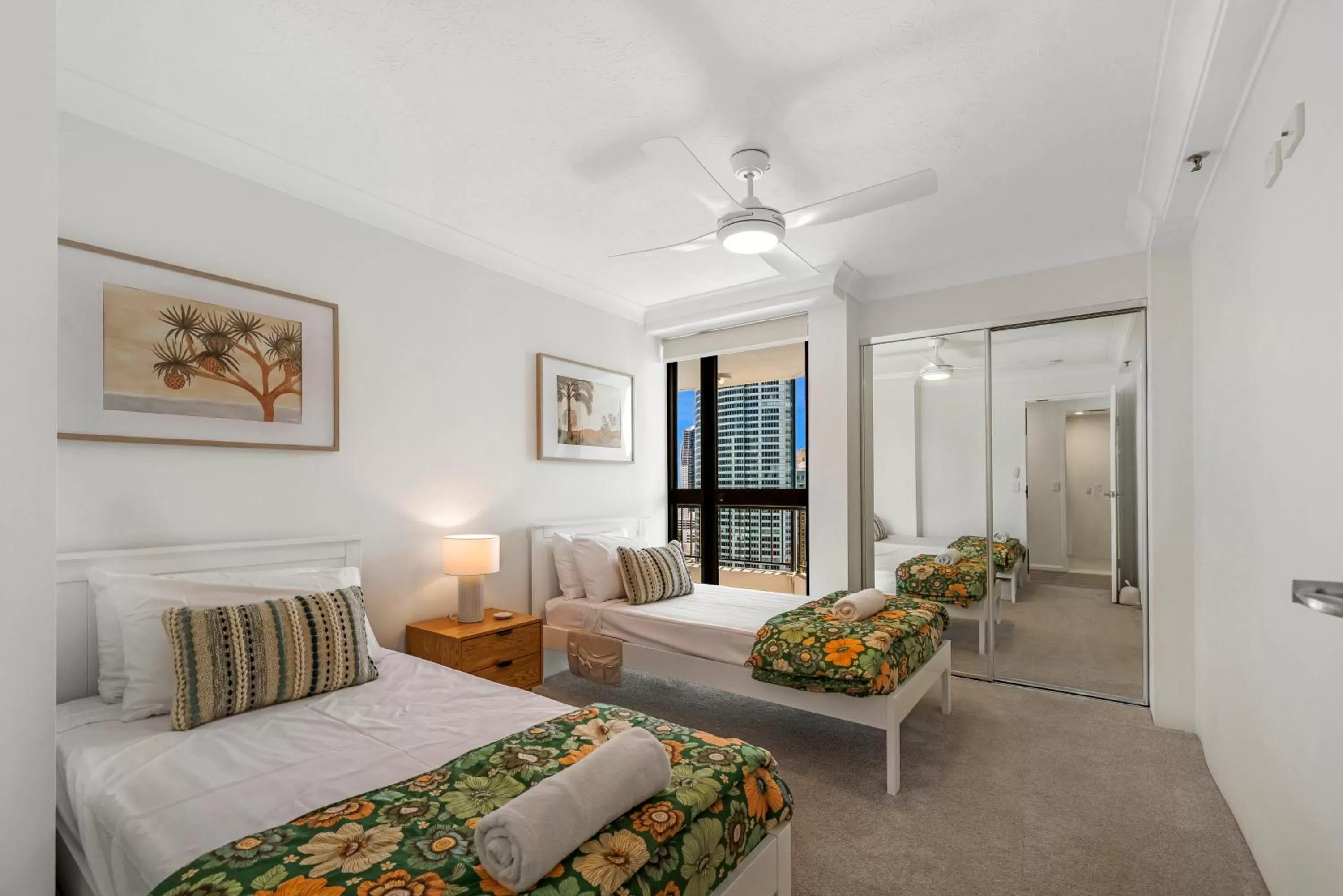 Bed in Surfers Century Oceanside Apartments