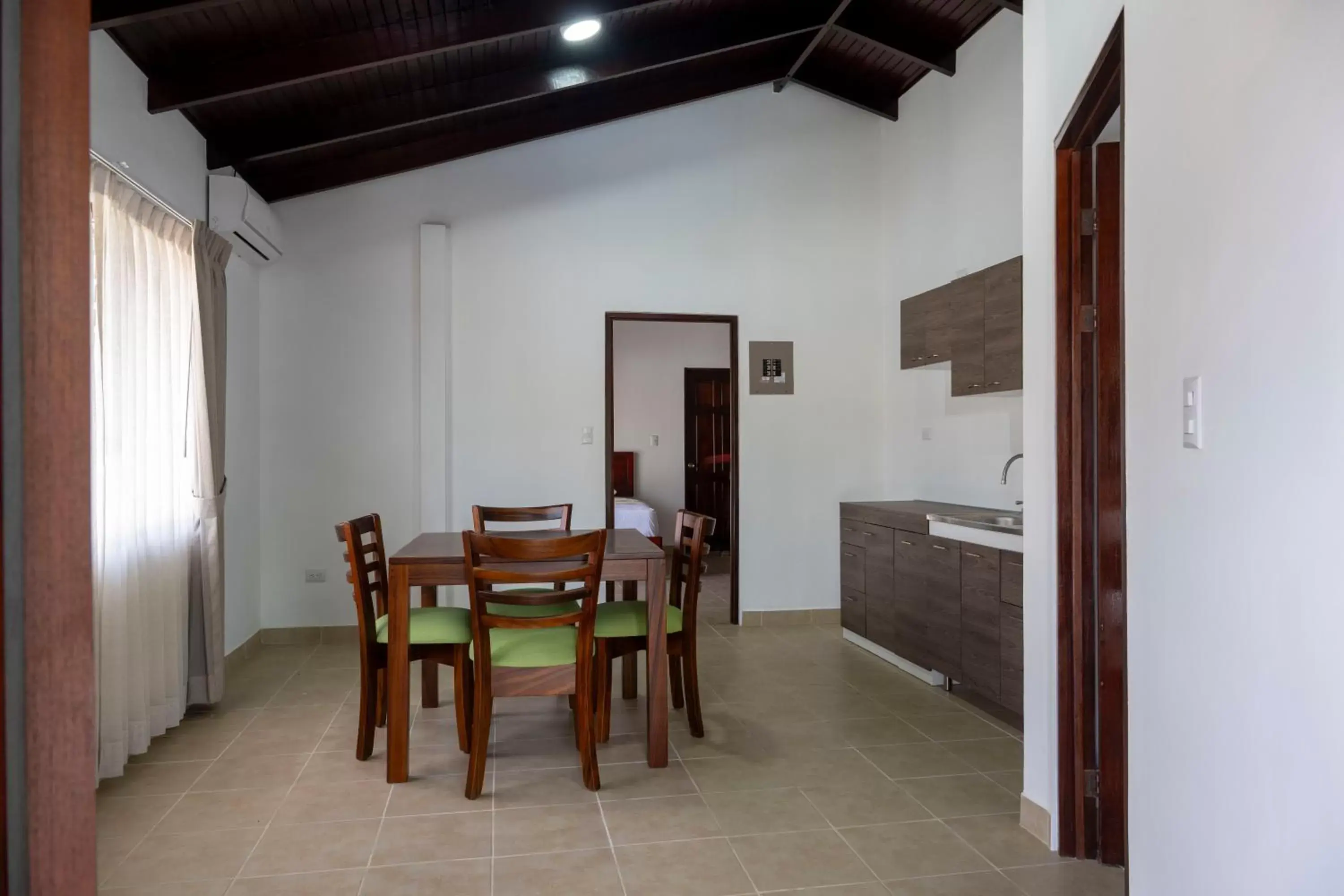 Kitchen or kitchenette, Dining Area in Fuego del Sol Beachfront Hotel