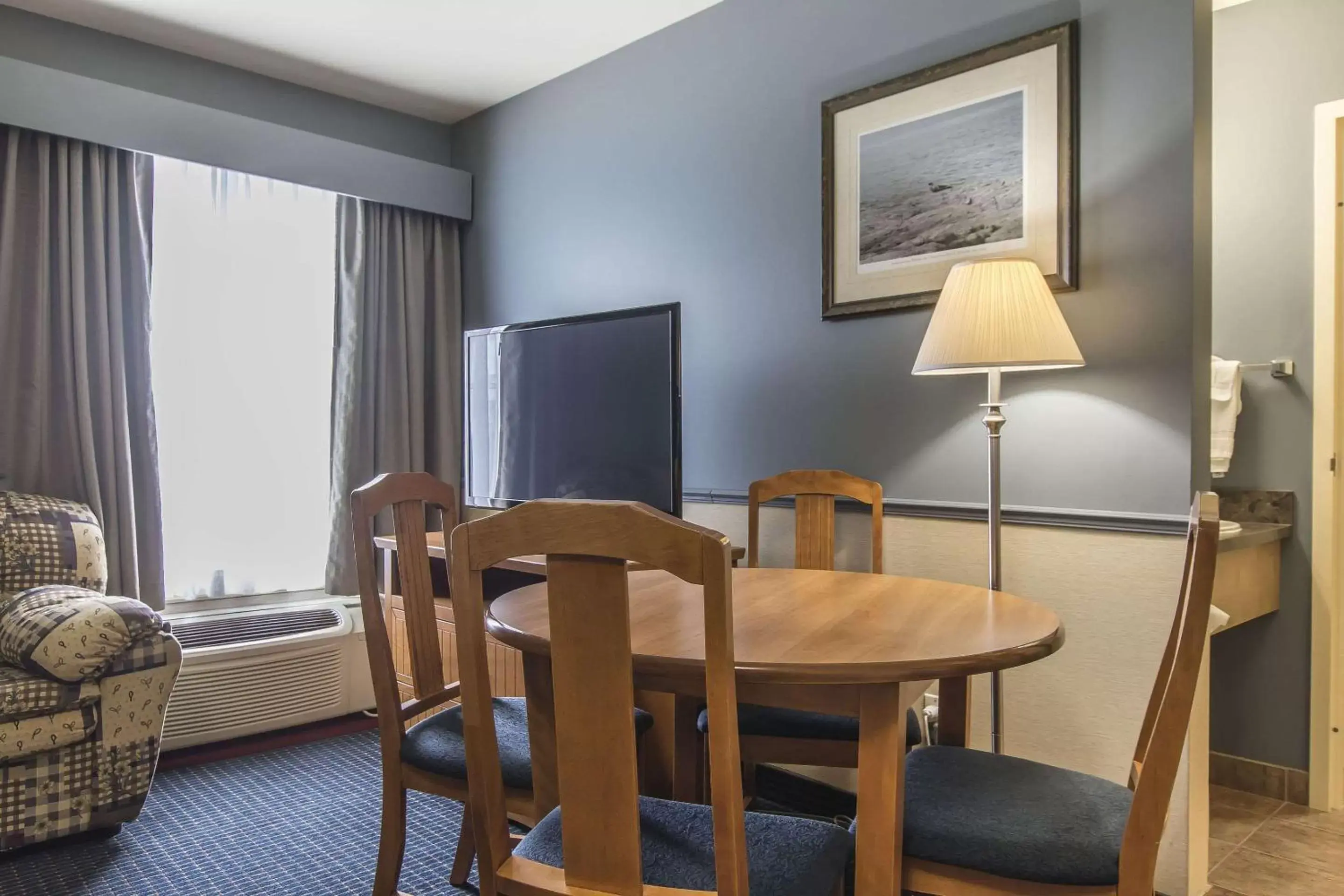 Photo of the whole room, TV/Entertainment Center in Quality Inn Riviere-Du-Loup