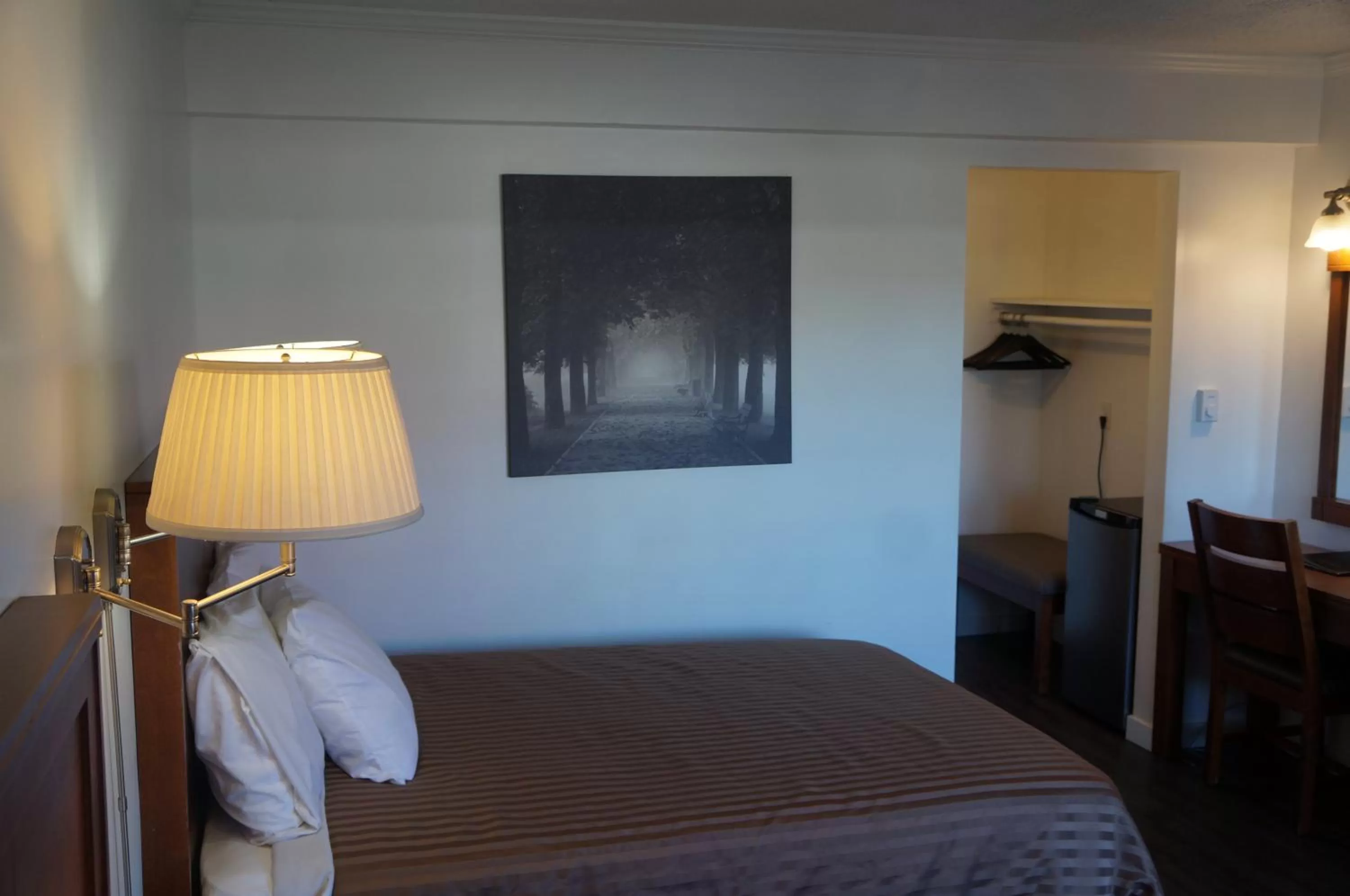 Bed in Westward Inn & Suites