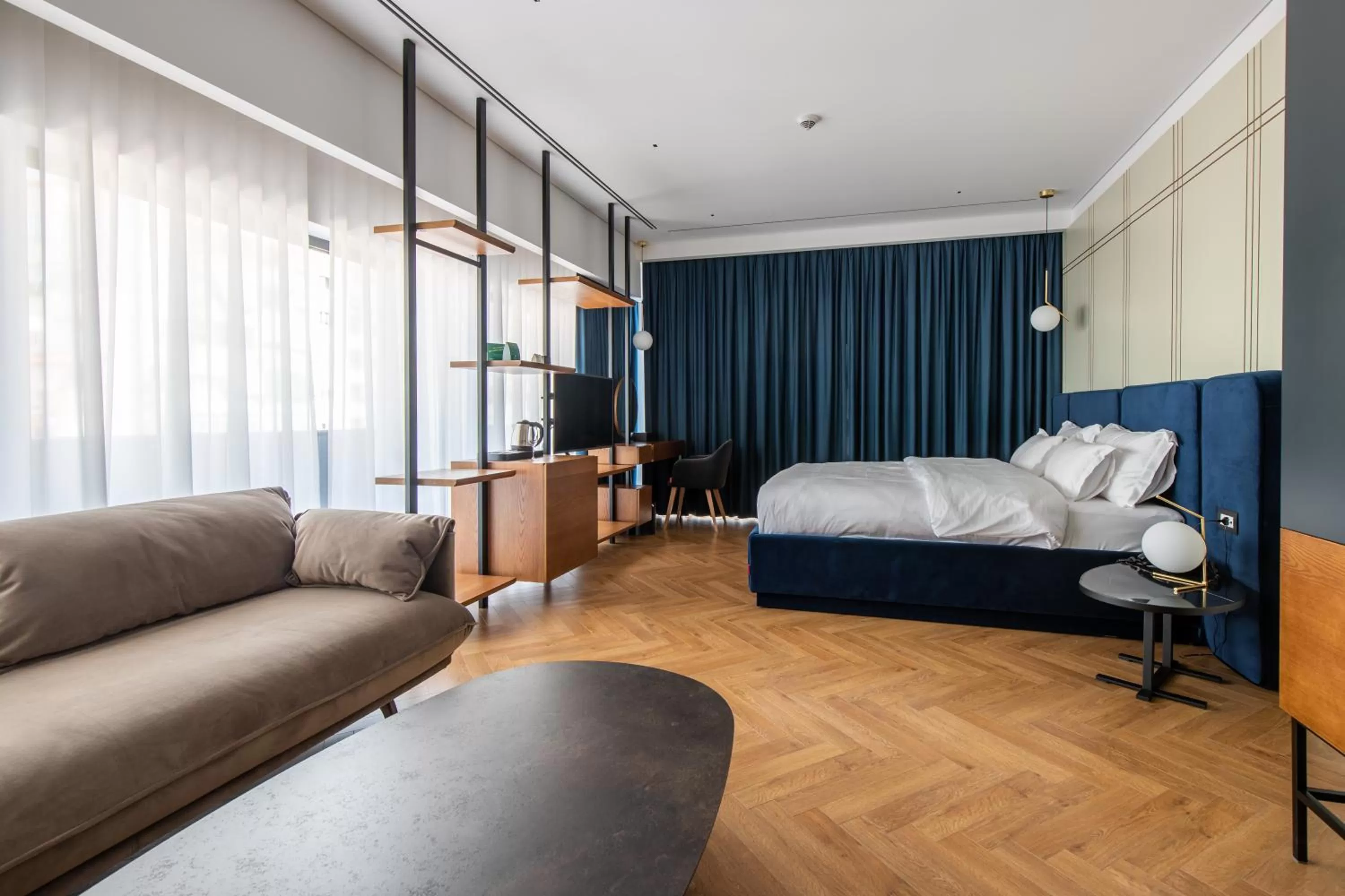 Living room, Bed in Moncafe Boutique Hotel & SPA Tirana