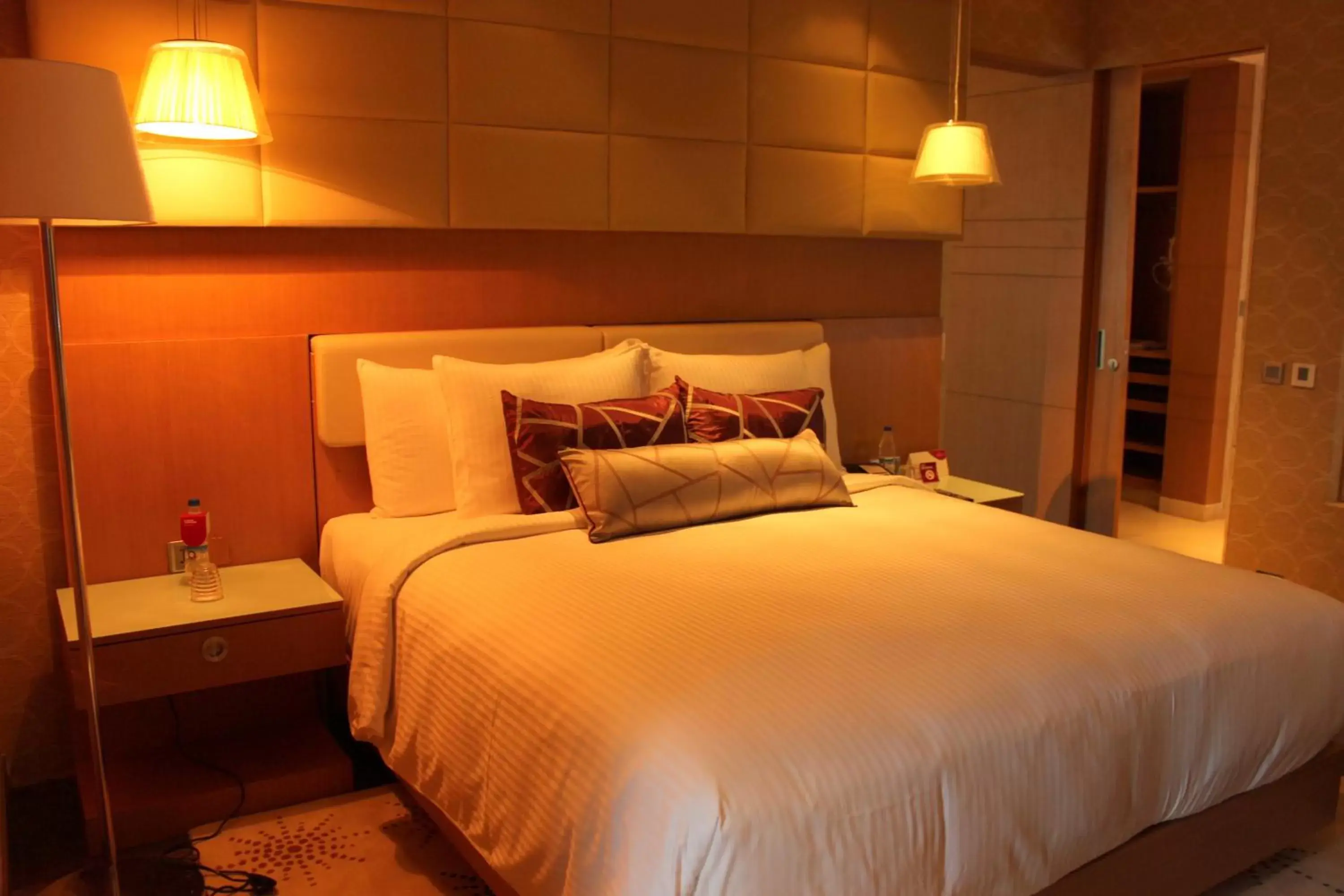 Bed in Crowne Plaza Greater Noida, an IHG Hotel