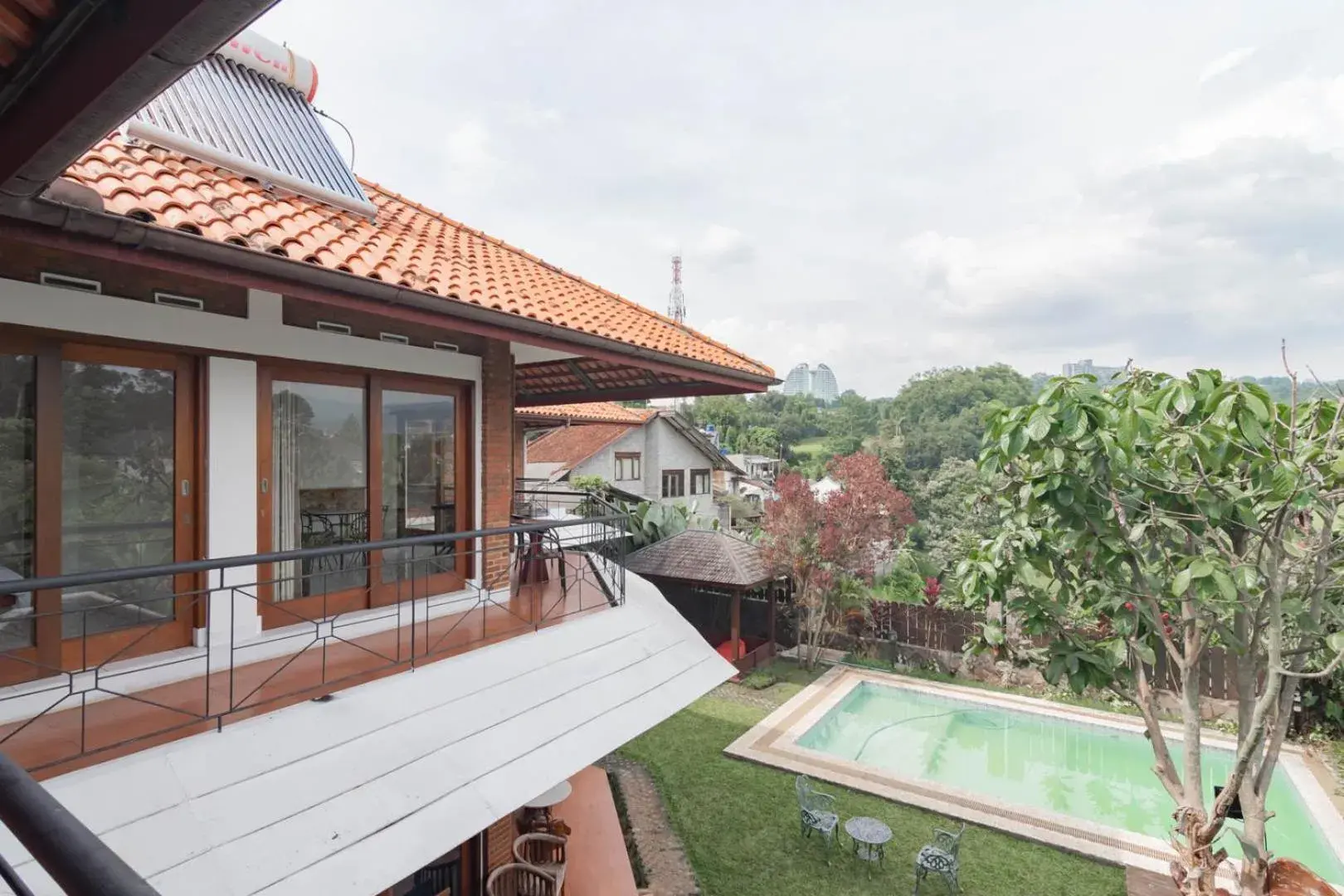 Swimming pool, Pool View in RedDoorz Plus near Dago Pakar