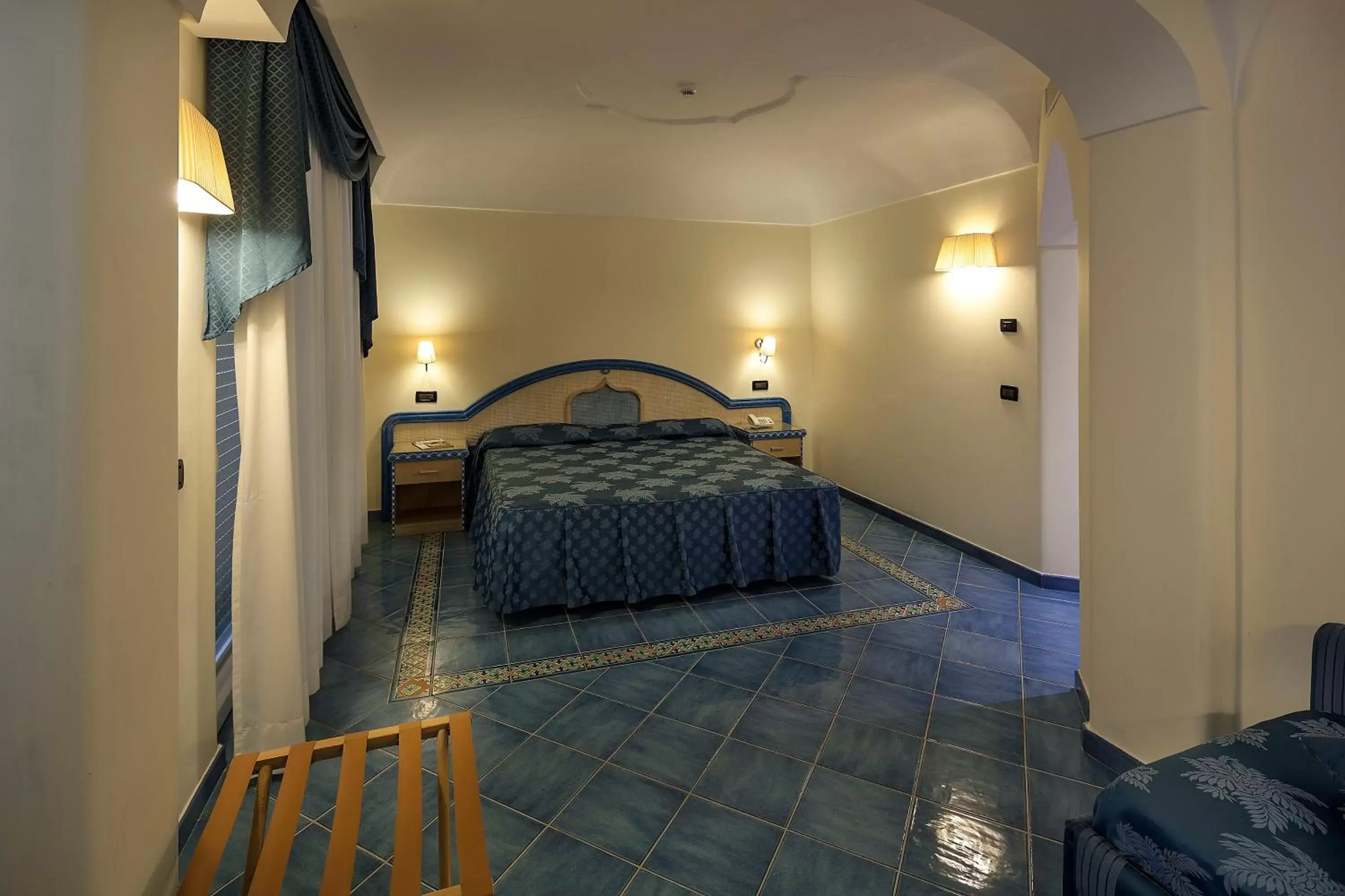 Bed in Sorriso Thermae Resort & Spa