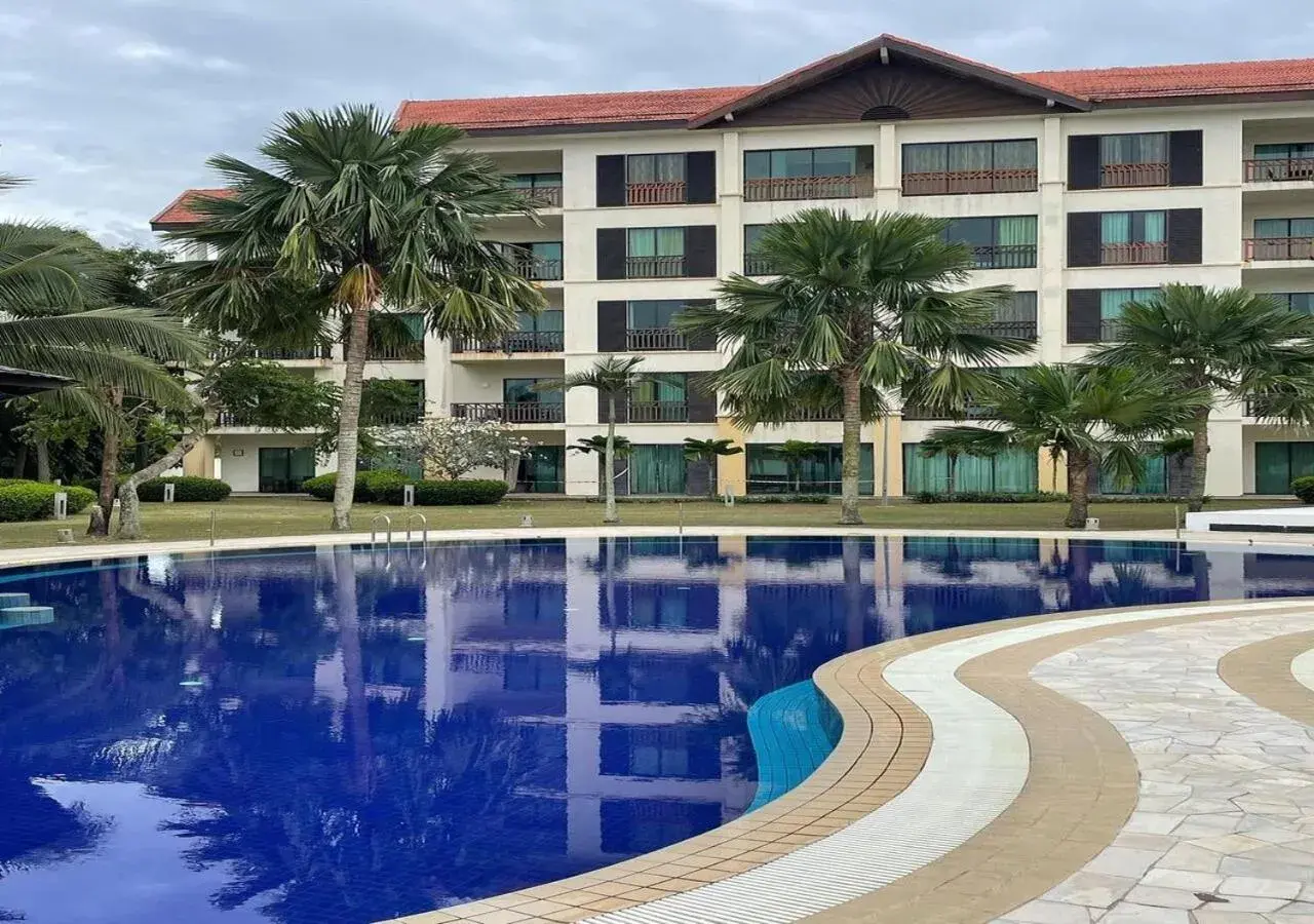 Swimming pool, Property Building in Borneo Beach Villas