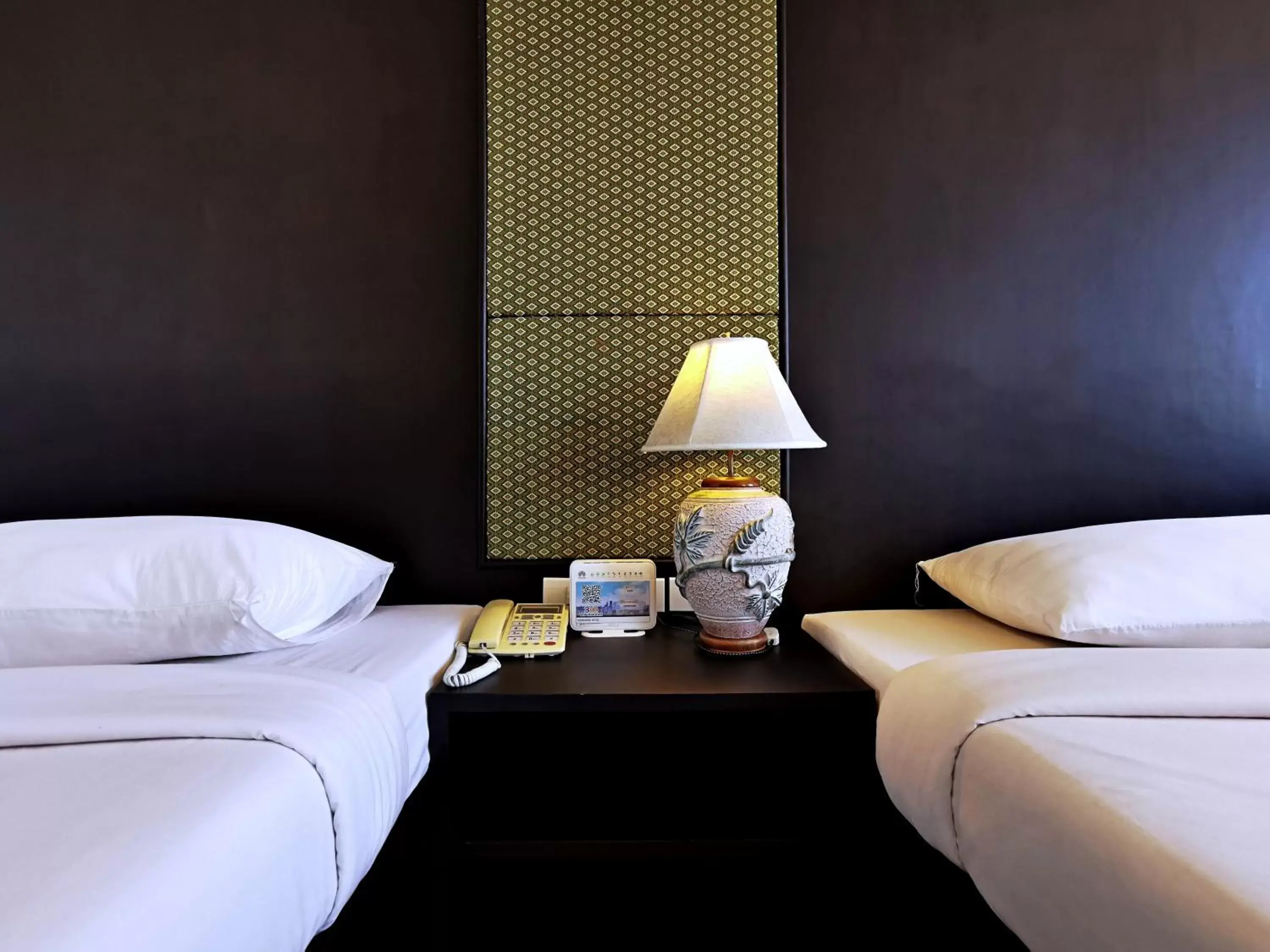 Bed in Nana Buri Hotel