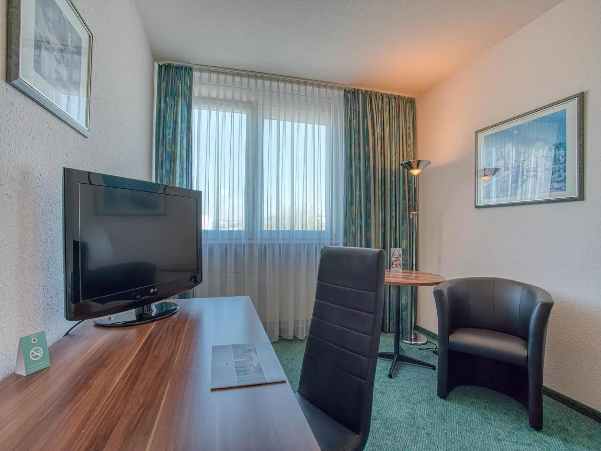 Seating area, TV/Entertainment Center in Centro Hotel Böblingen