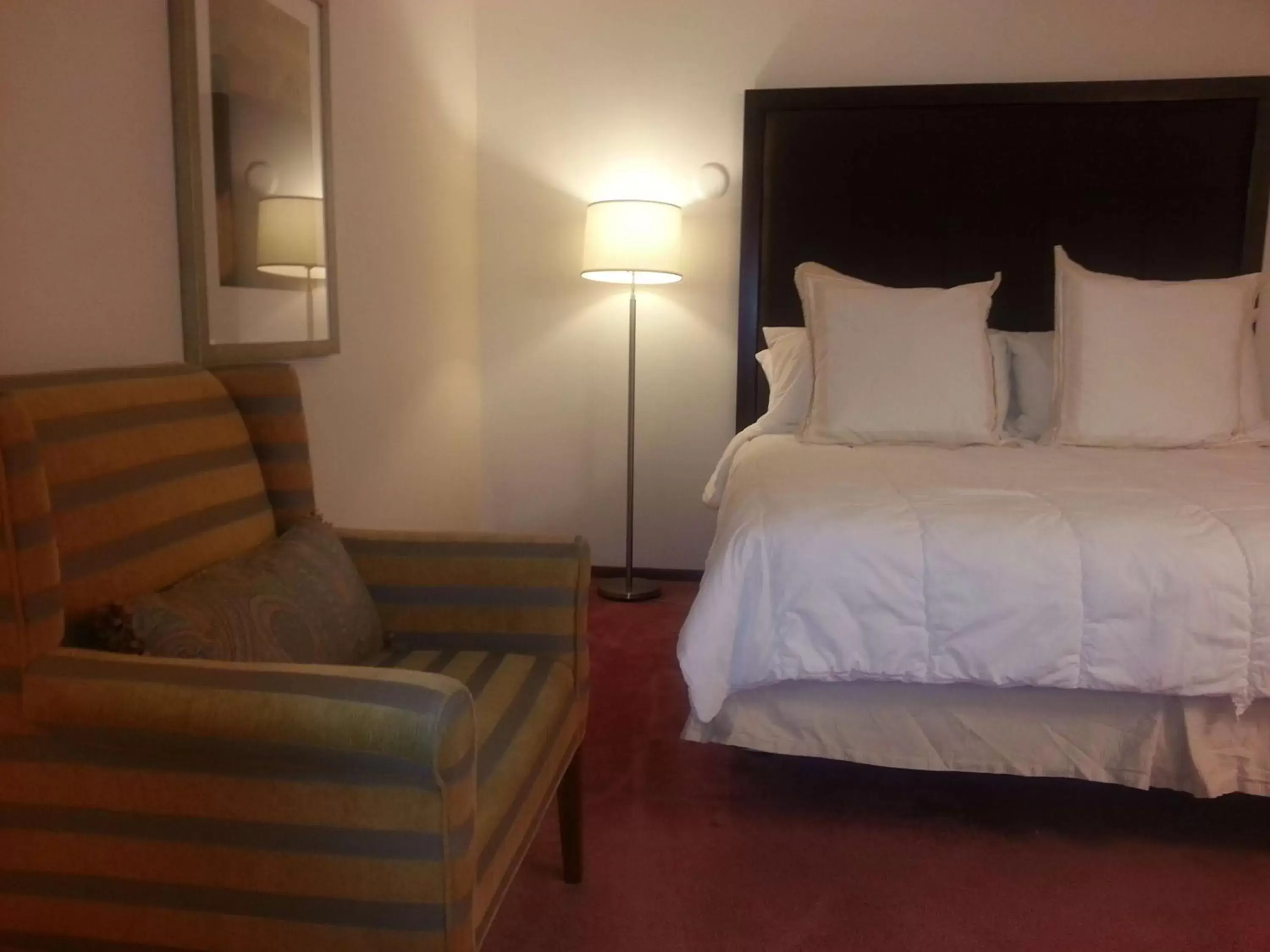 Photo of the whole room, Bed in Harlan Inn and Suites