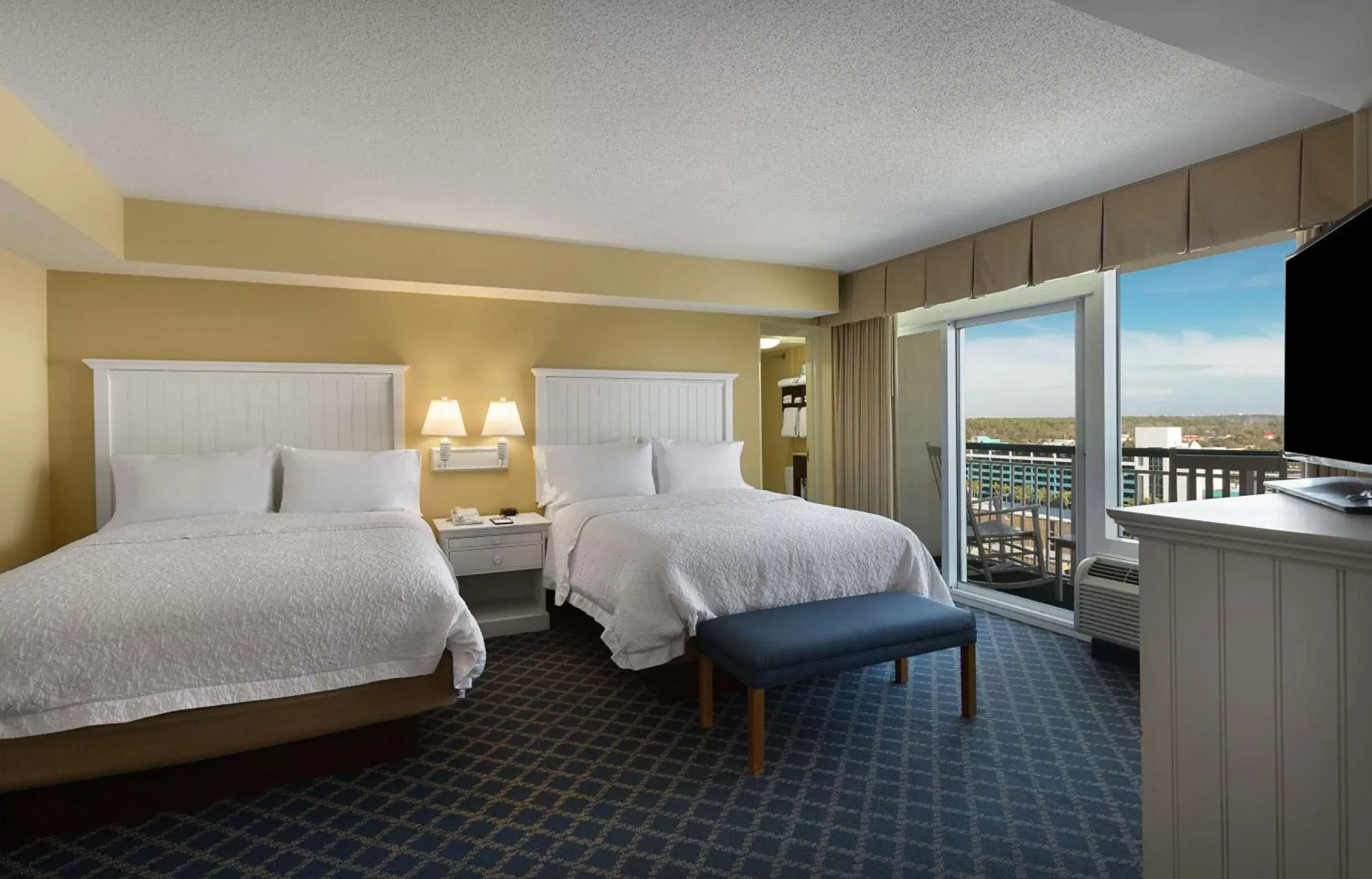 Bed in Hampton Inn & Suites Myrtle Beach Oceanfront
