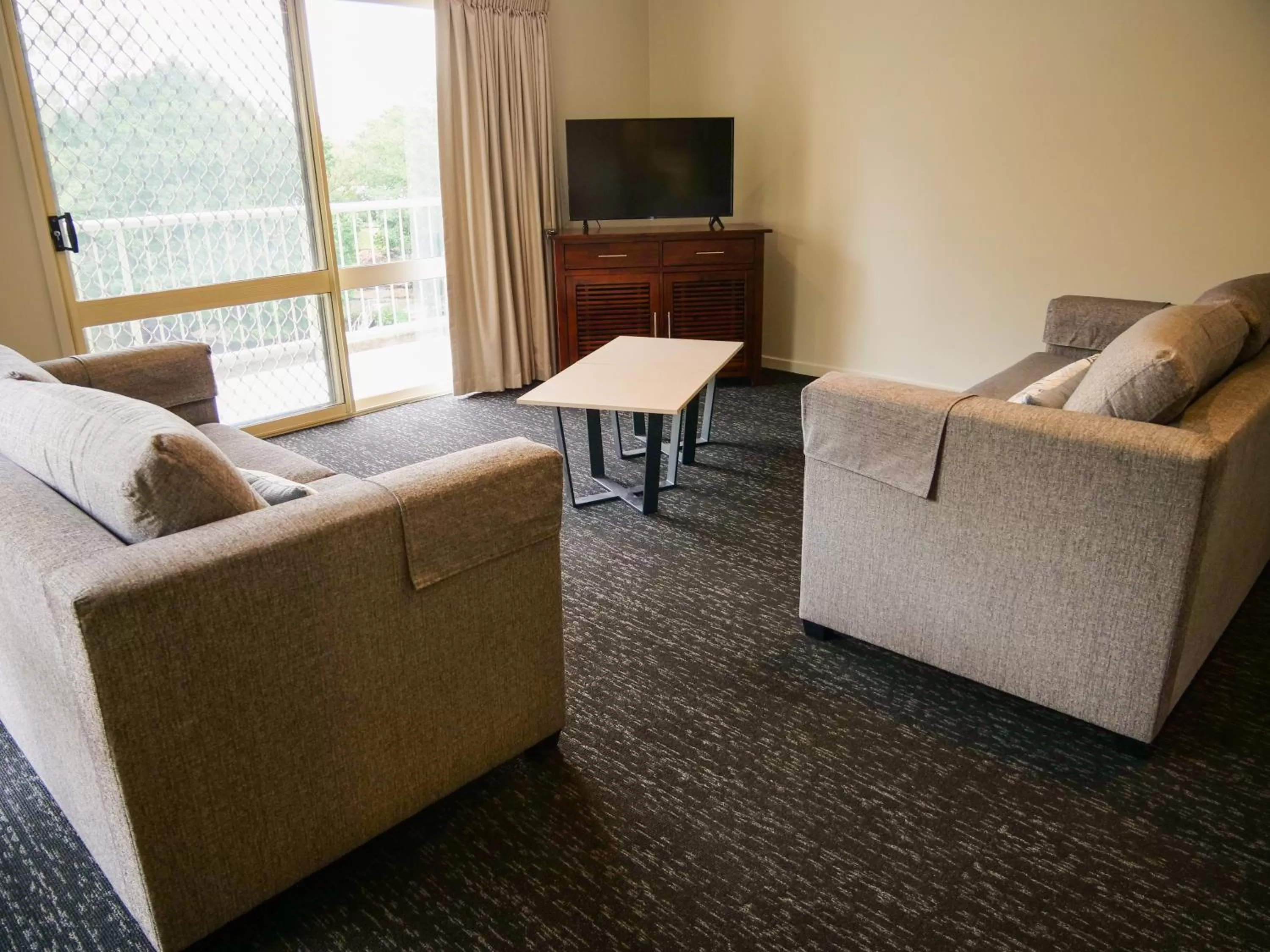 Seating area, Bed in Nightcap at Hinterland Hotel Nerang