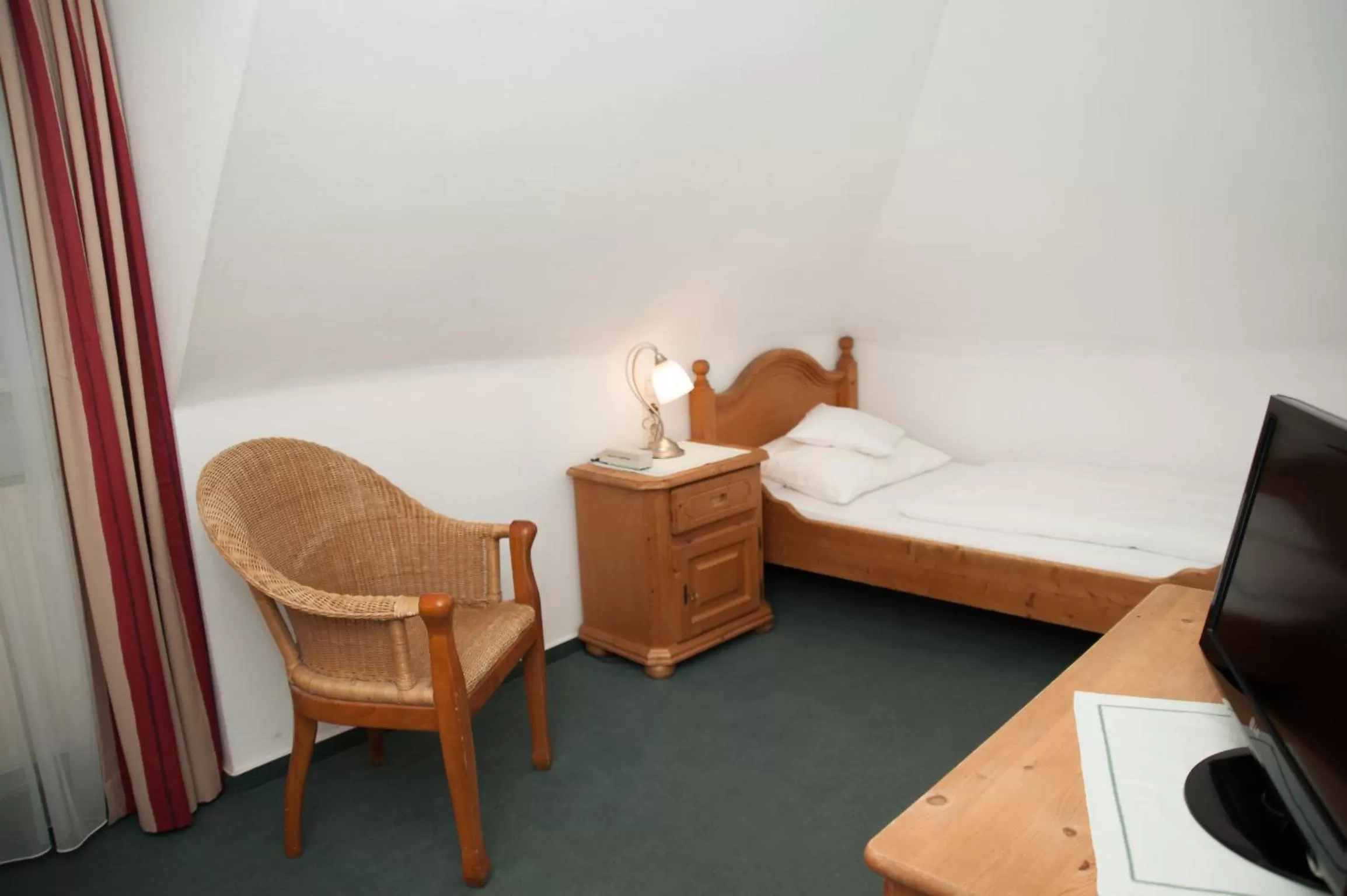 Photo of the whole room, Bed in Hotel Am Römerwall