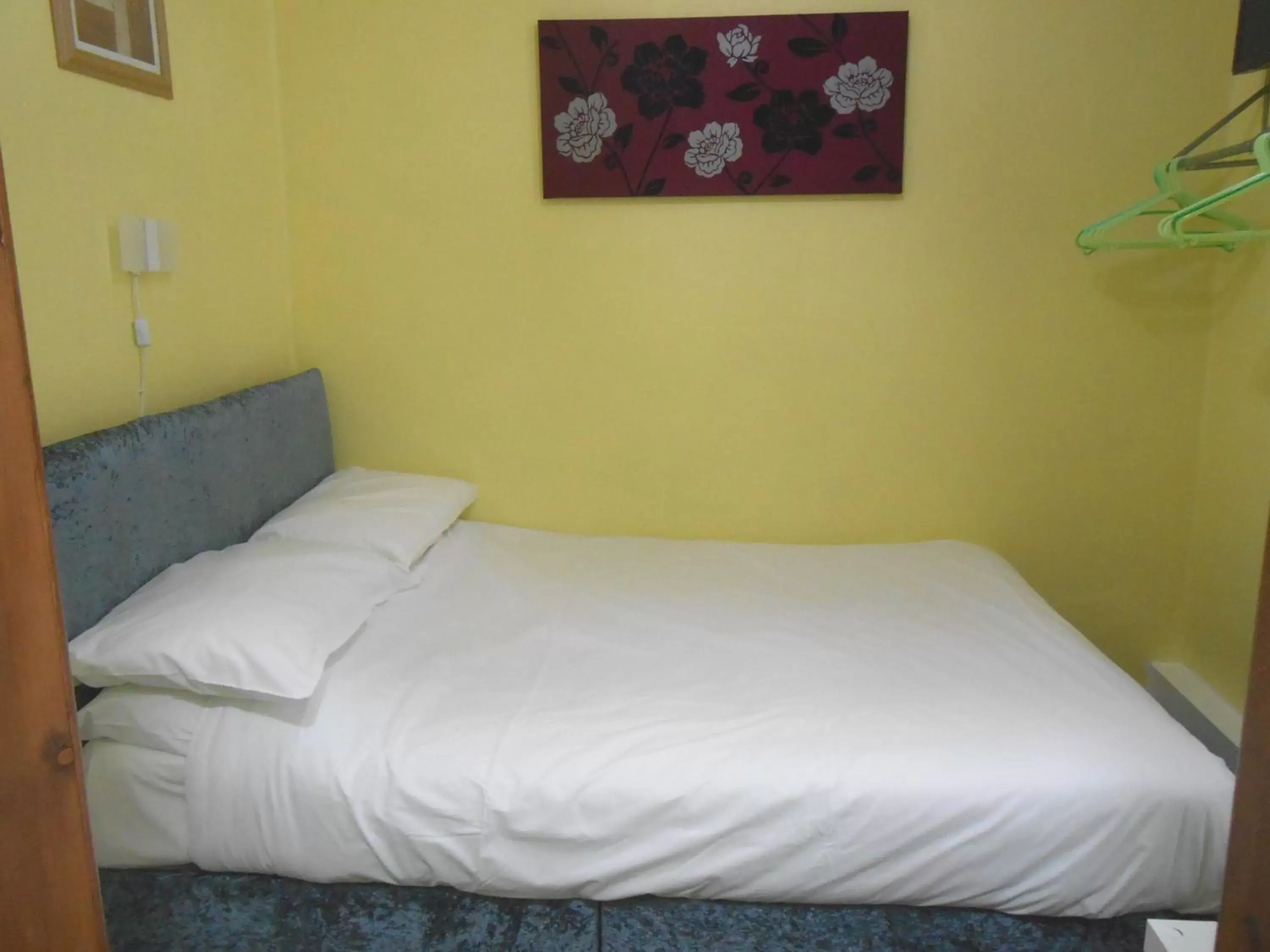 Bed in Shore Stay Guest House