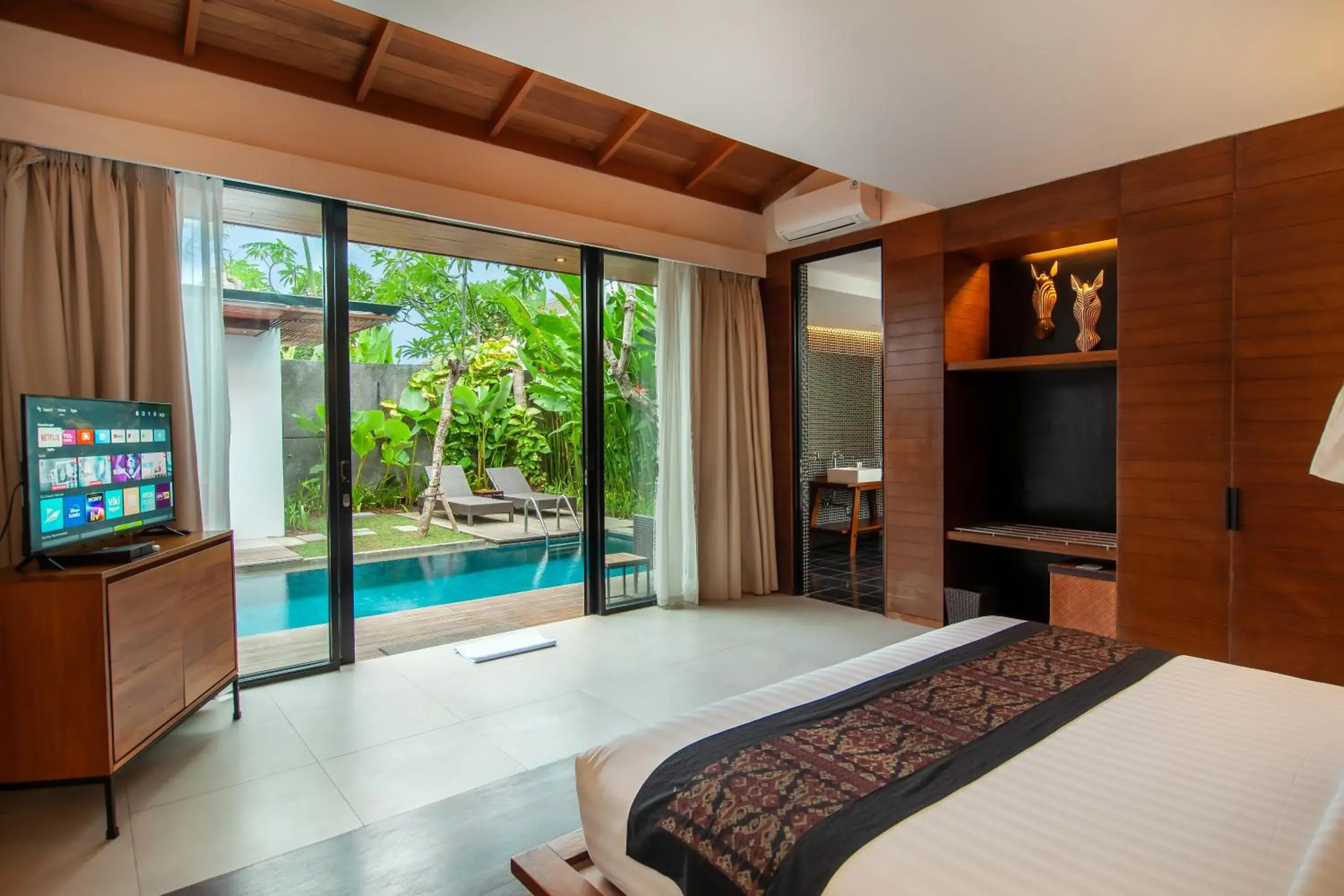 Bed, Pool View in Abia Villas