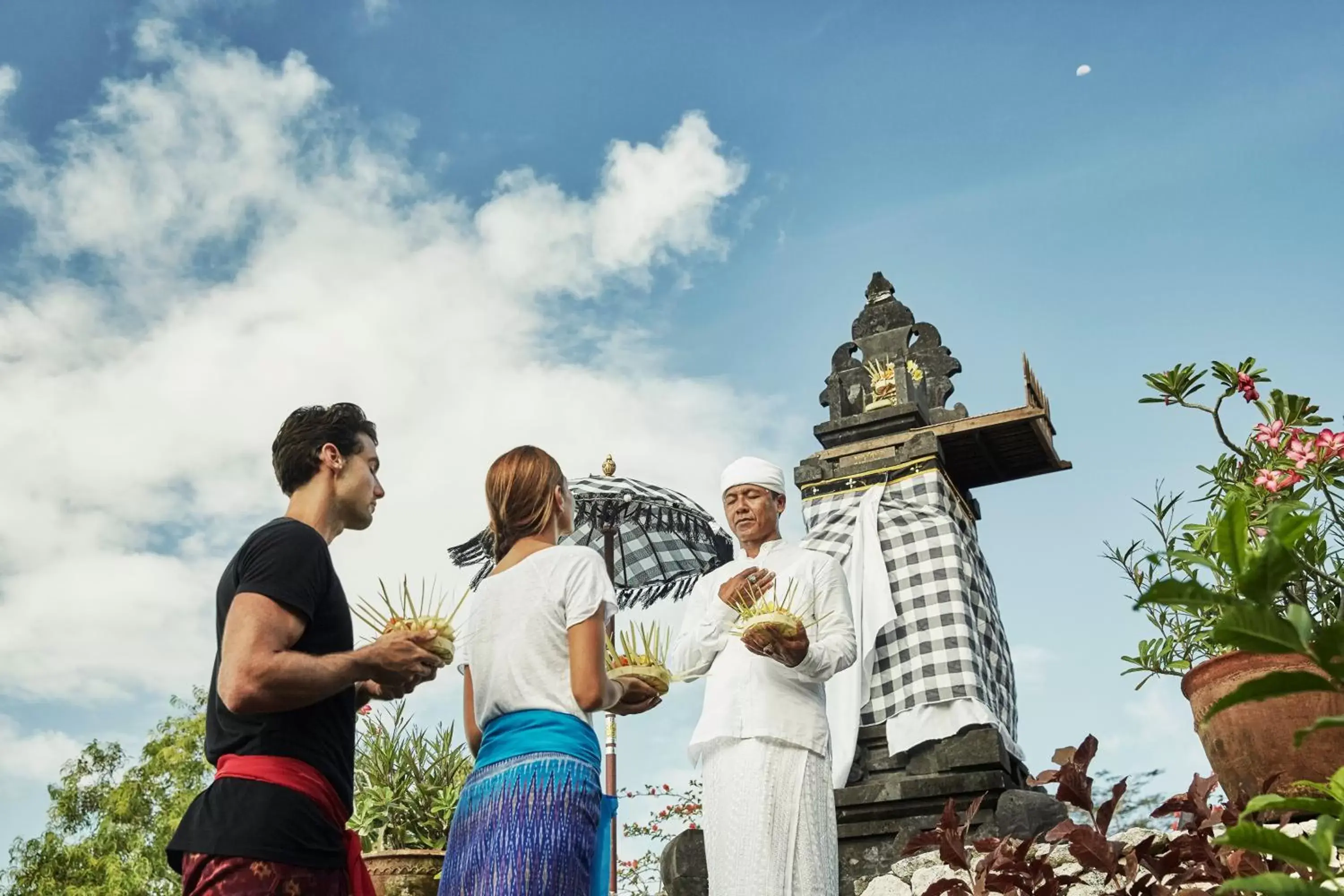 People in Four Seasons Resort Bali at Jimbaran Bay