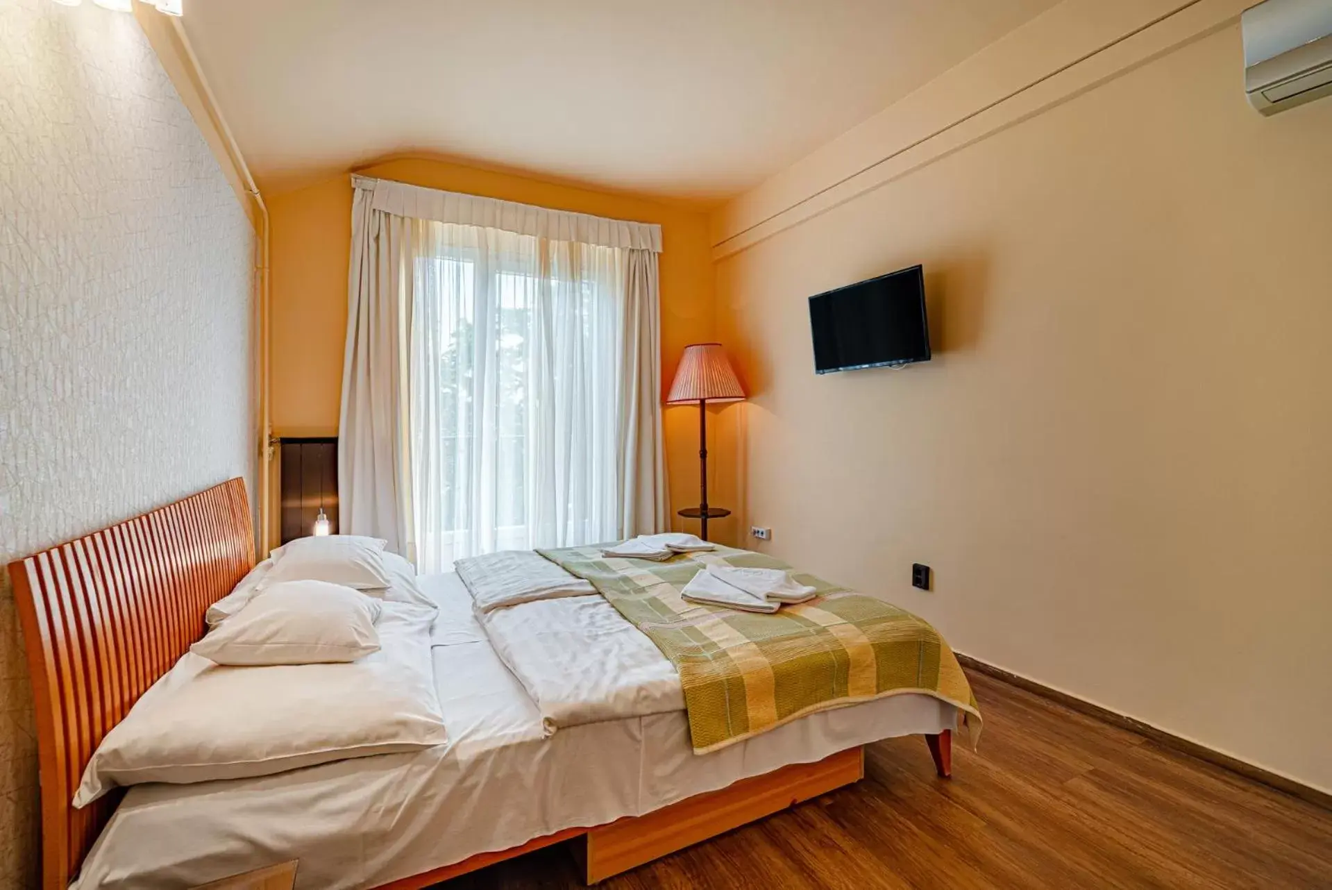 Bed in Hotel Bobbio