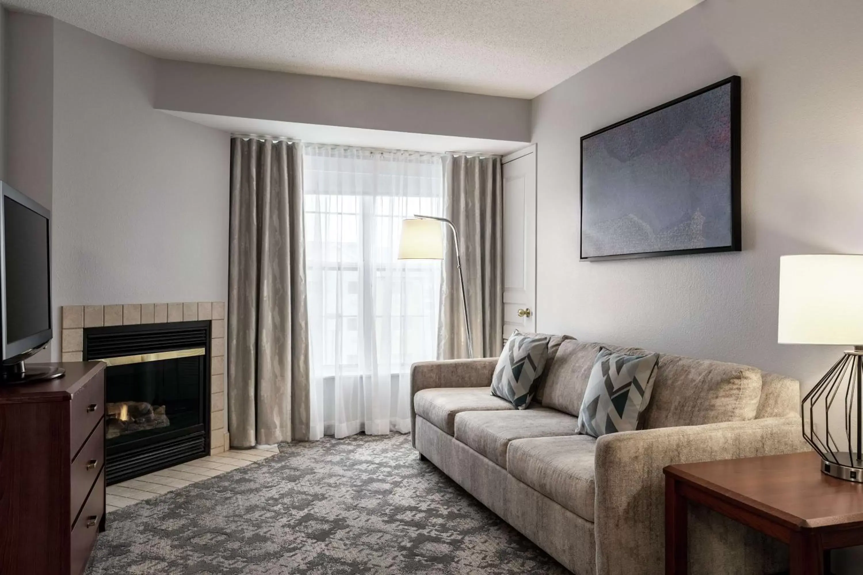 Living room in Homewood Suites by Hilton Erie Living room in Homewood Suites by Hilton Erie