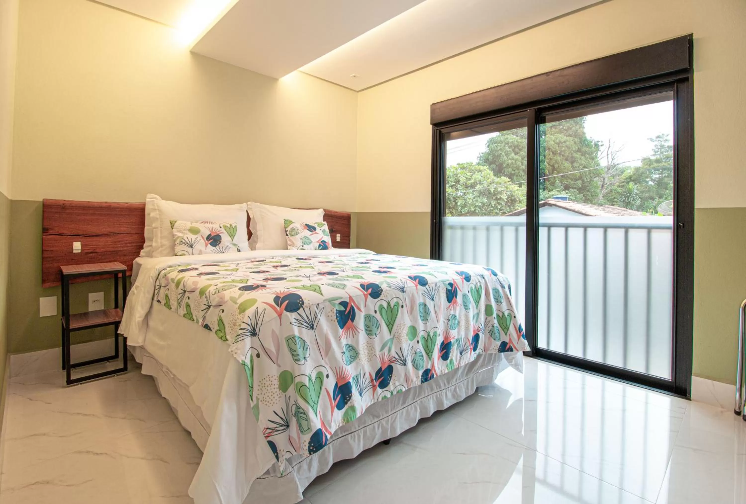 Bed in Pousada Flores do Carmo