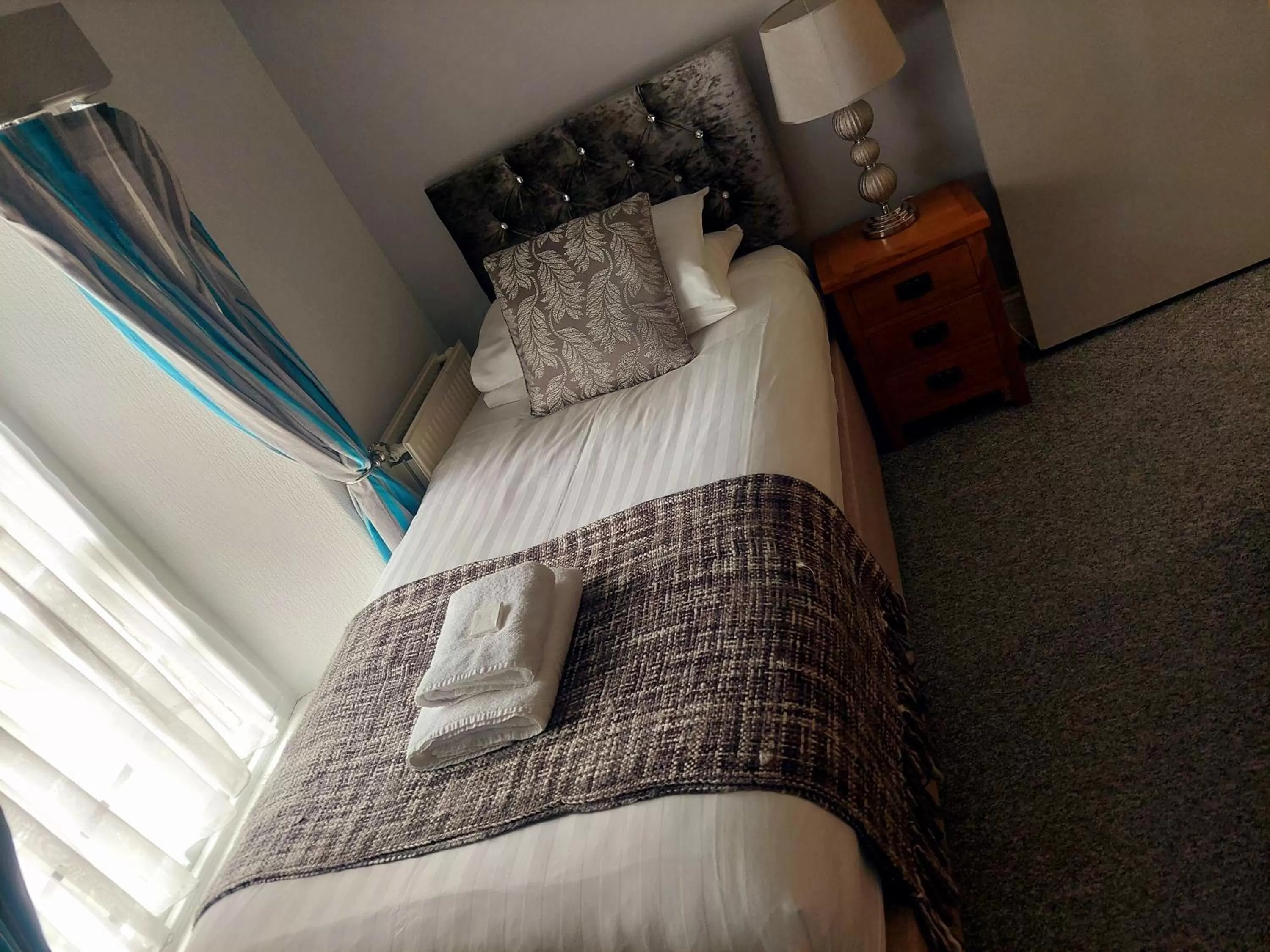 Bed in The Black Lion Royal Hotel