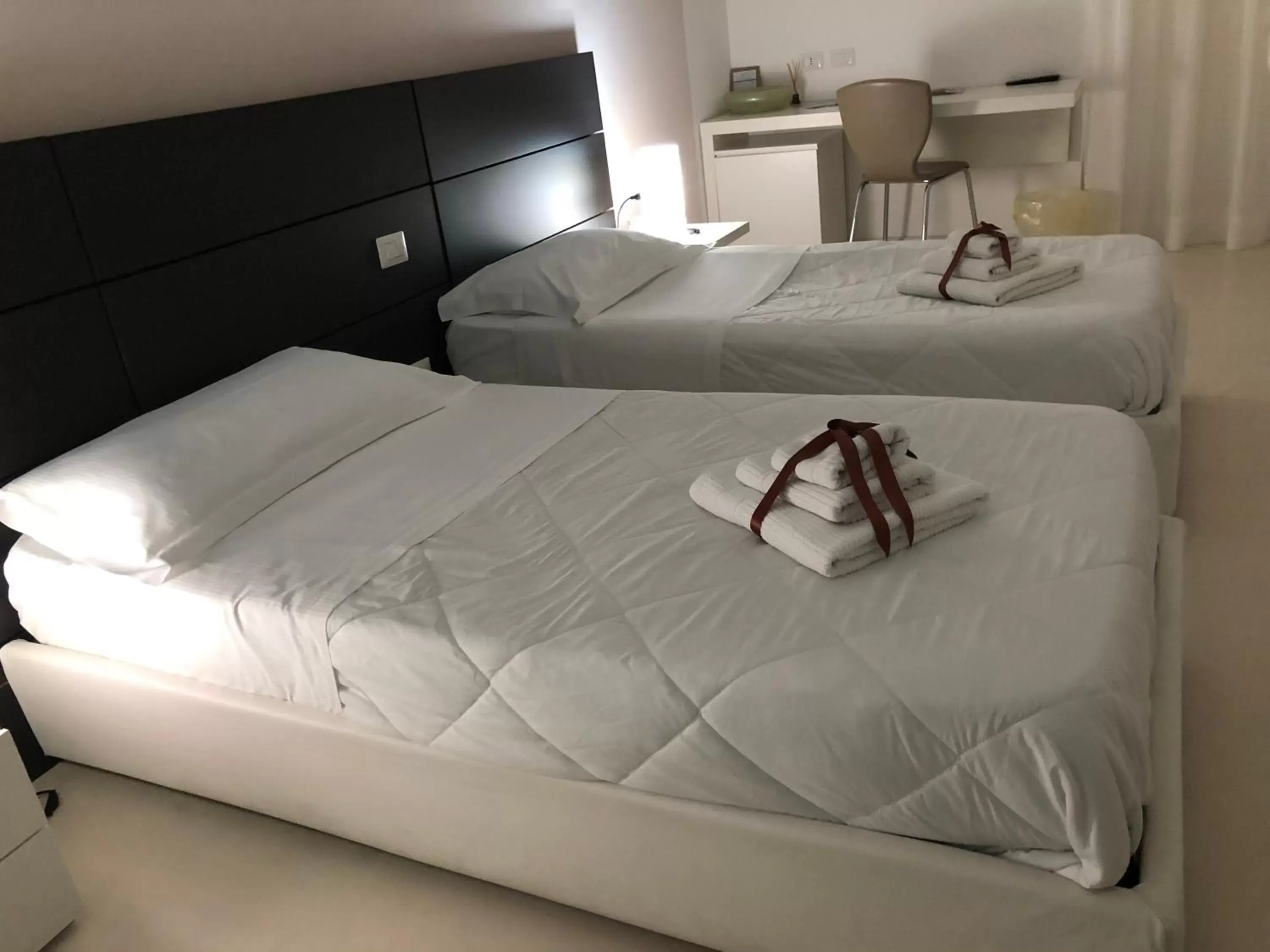 Bed in Hotel Cave Del Sole